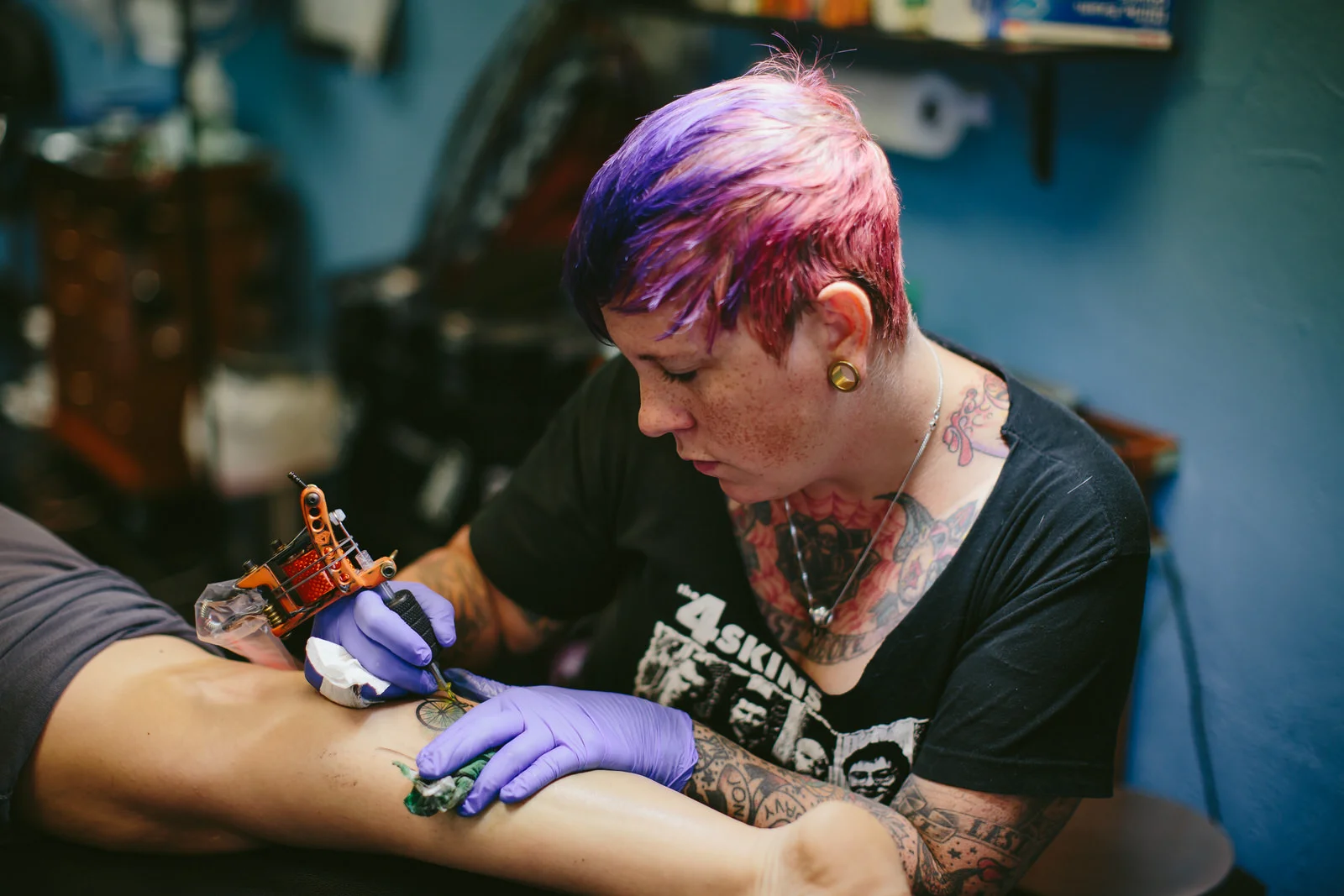 Bianca Lemay tattooing my first tattoo at Neptunes Daughter in Wilton Manors Florida