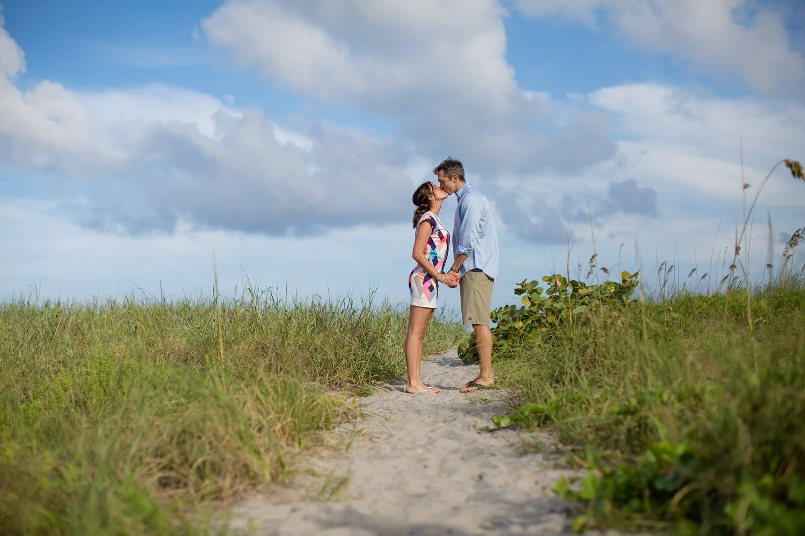 couple-beach-engagement-portraits-tiny-house-photo.jpg