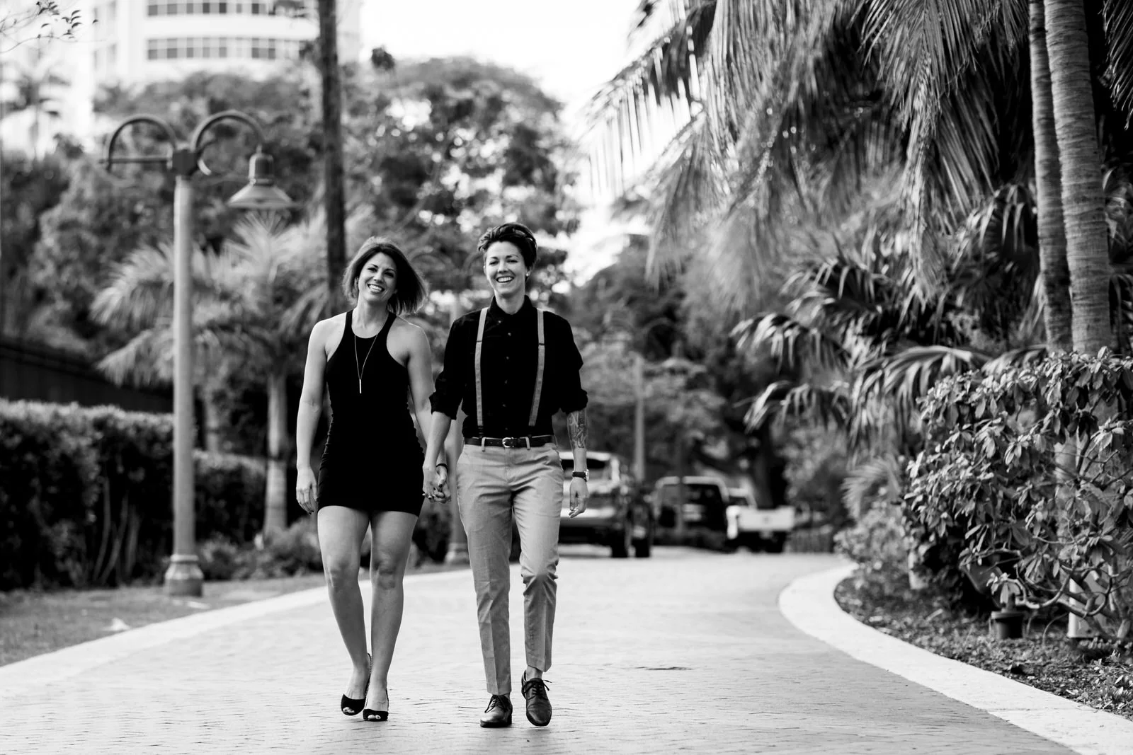 black-and-white-portrait-fun-couple-walking-fort-lauderdale-florida.jpg