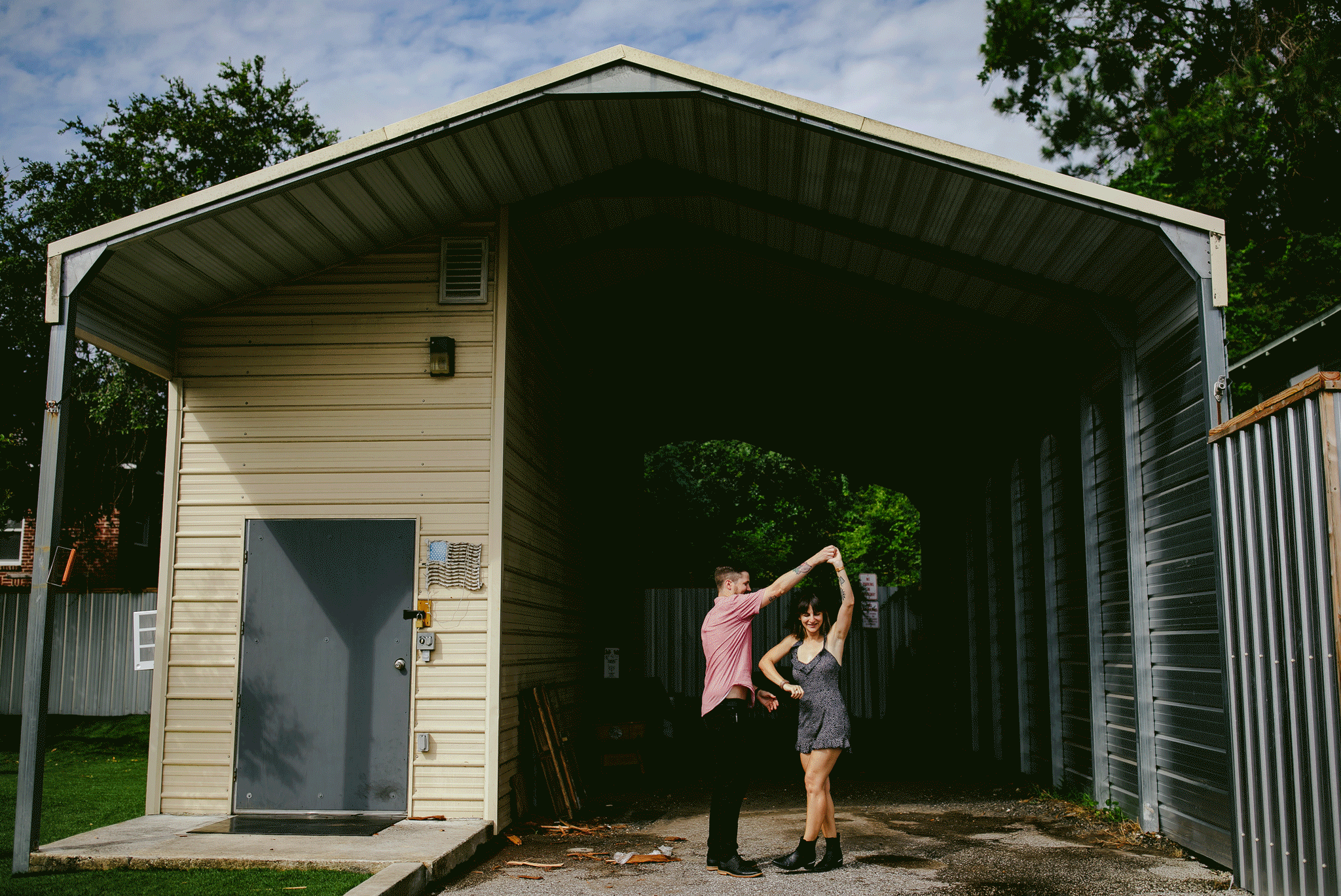 Tattooed-couple-dancing-barn-jacksonville-florida-tiny-house-photo.gif