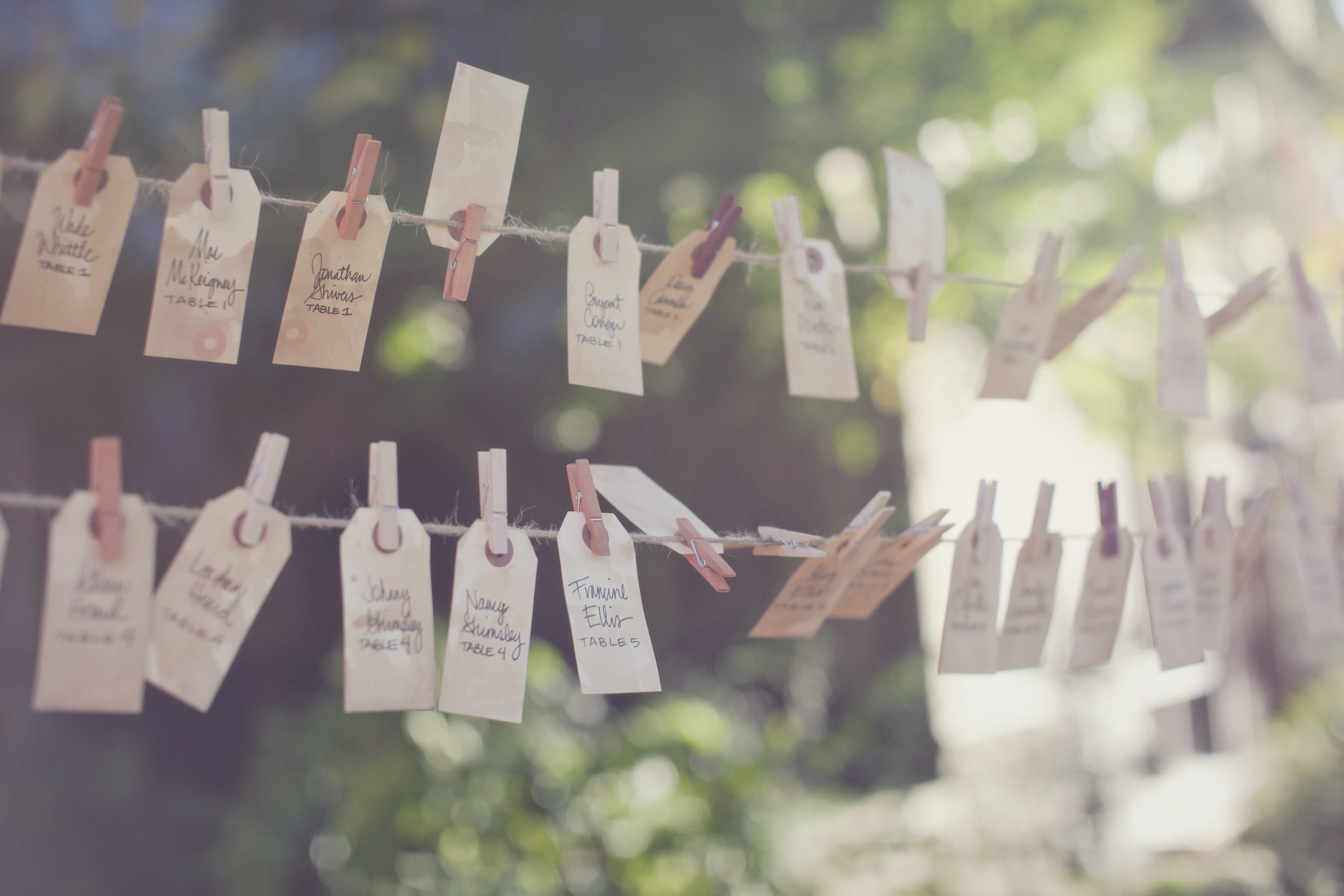 Escort Card Tags on Clothesline | Simply Charming Socials | Atlanta Wedding Planner