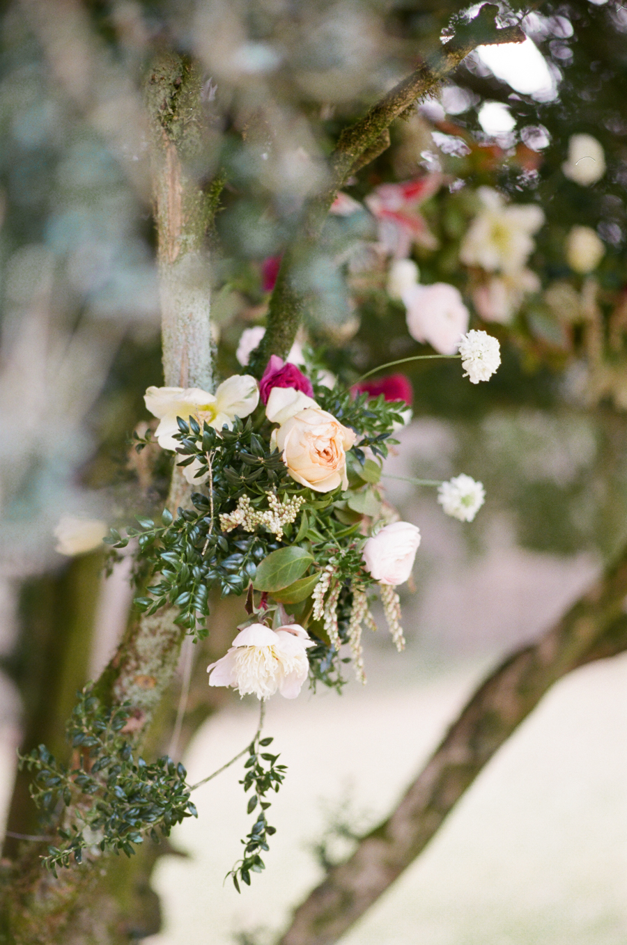 Colorful Floral Installation on Tree | Simply Charming Socials | Atlanta Wedding Planner