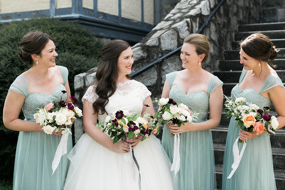 Bride and Bridesmaids in Pastel Green Dresses | Simply Charming Socials | Atlanta Wedding Planner