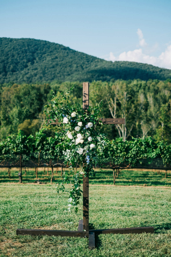Cross with Florals for Wedding Ceremony | Simply Charming Socials | Atlanta Wedding Planner