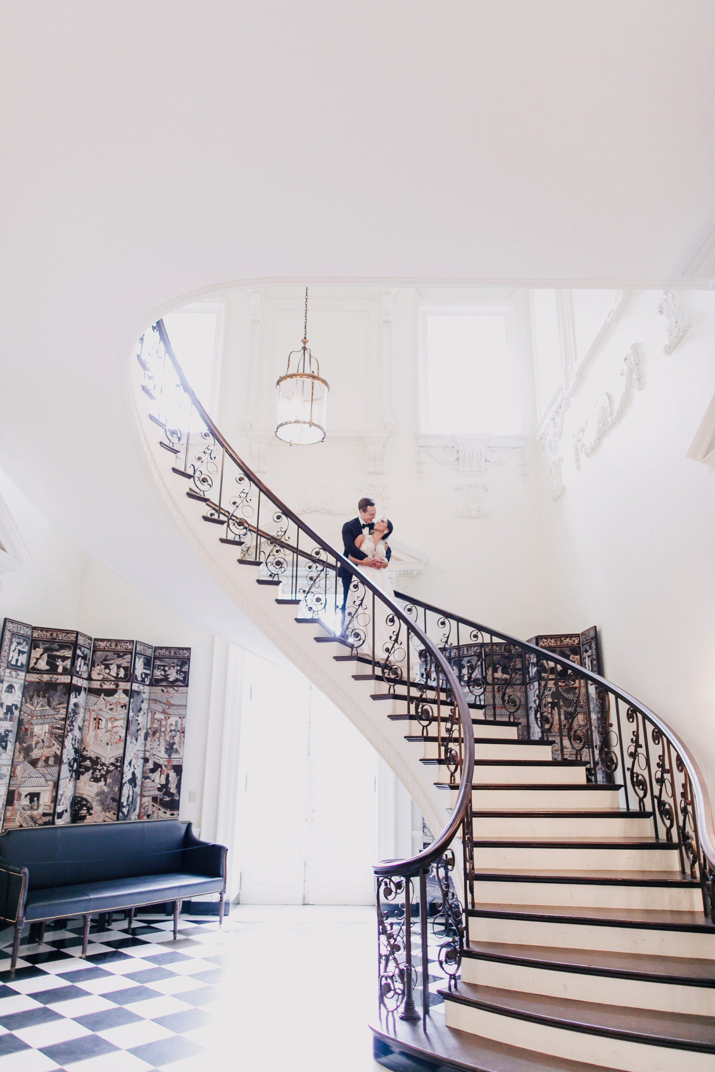 Bride and Groom Portraits on Staircase | Simply Charming Socials | Atlanta Wedding Planner 