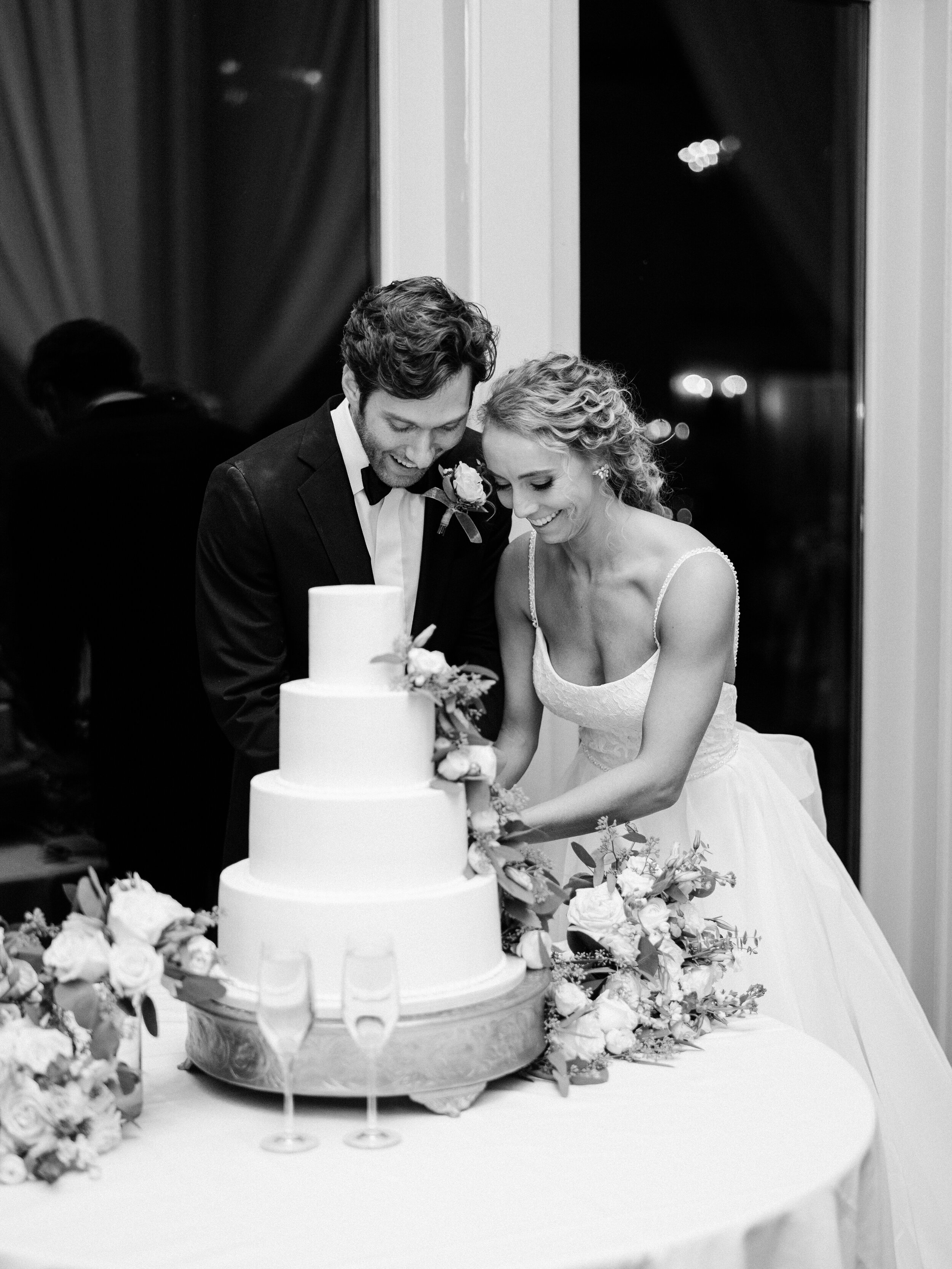 Bride and Groom Cutting the Cake | Simply Charming Socials  | Atlanta Wedding Planner