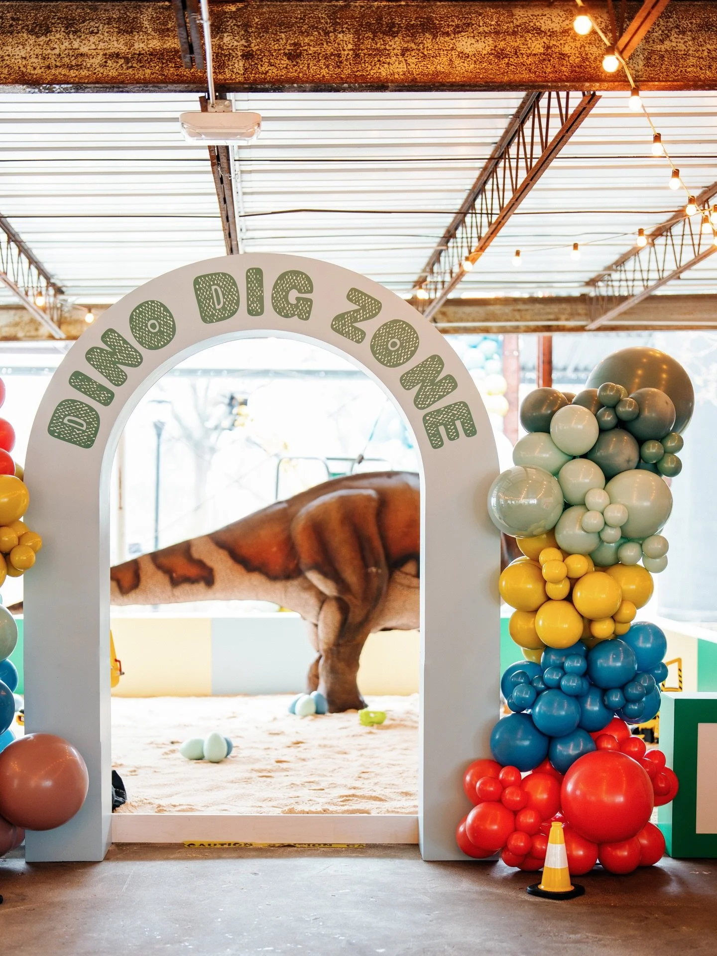 Diggers &amp; Dinos - what more could a little guy want? This birthday party was an extravaganza of color, interaction, activities, treats, and overall fun. We orchestrated a team of over twenty vendors and partners to create this experience for Seba