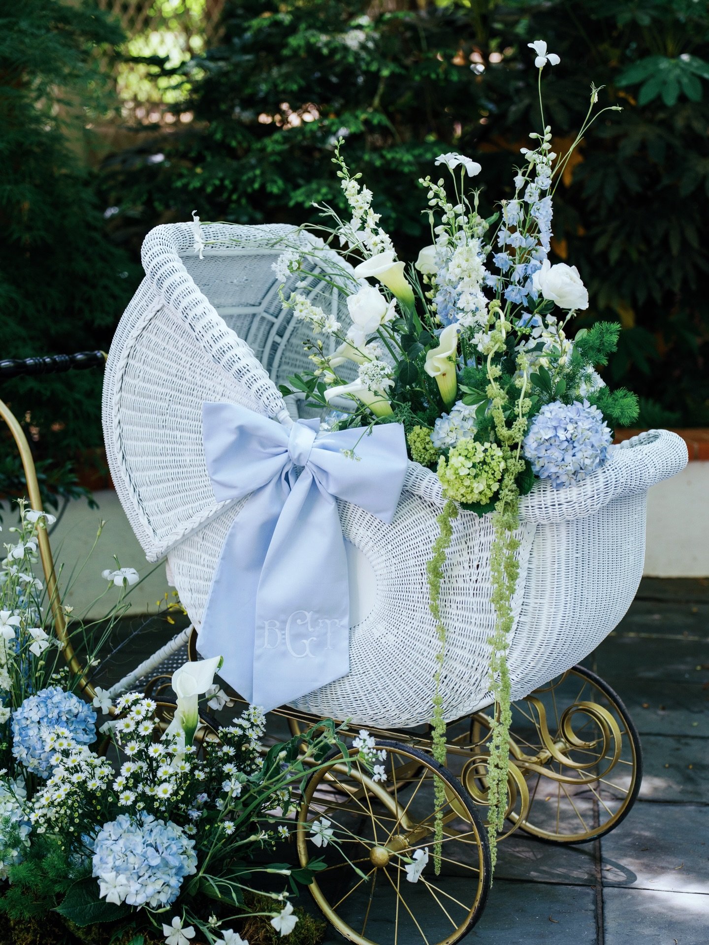 Blooms in a buggy and blue toile bears for Brittany and baby Beckham. This very sweet Sunday afternoon at the historic Swan Coach House was filled with so much joy, baby heirlooms, and breezy blue skies as we showered mama-to-be. Brittany requested c