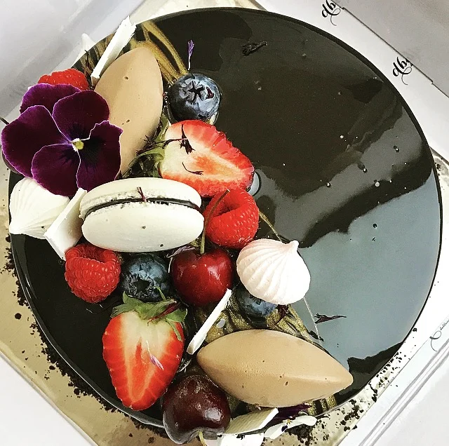 BLACK FOREST ENTREMET Chocolate sponge, Cadburys Milk Chocolate Mousse, Cherry Compote, Whipped Cream, Dark Chocolate Mirror Glaze, Mixed Berries, Macaron, White Chocolate Shards, Edible Flowers 6" size $49.00 Feed upto 8 8" size $69.00 Feed upto 12 THIS ITEM CONTAINS NUTS