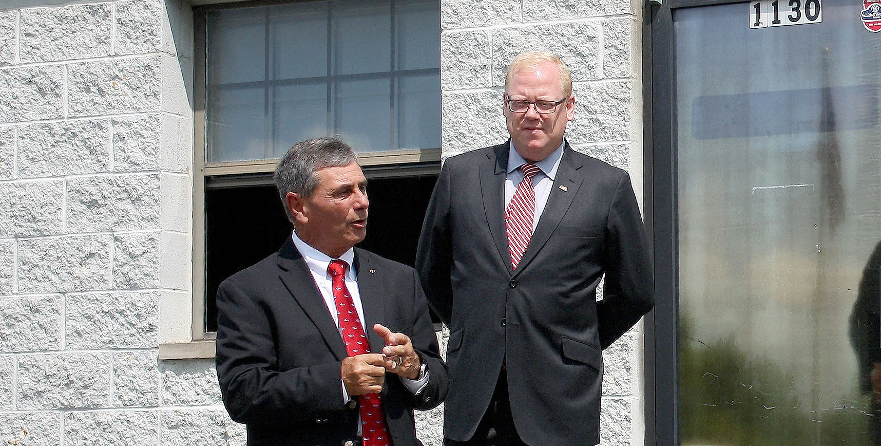 Tom Kneeland, Mayor of The City of Gahanna (left), addresses the crowd. Bob Grote, CEO of the Grote Company (right)