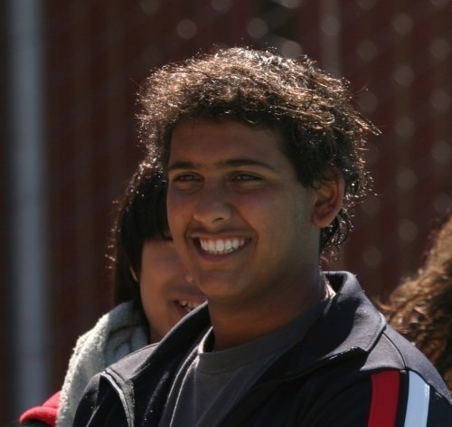 Shounak on the Gunn High School swim team in 2007, where he met his wife Laura.