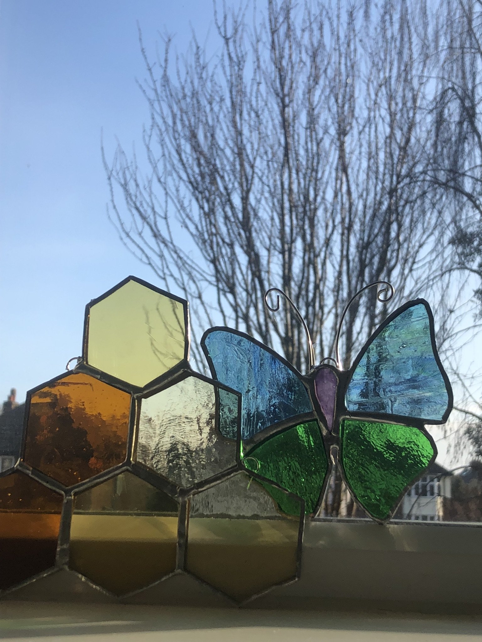 Birds and bees stained glass