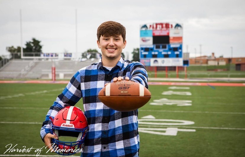 That moment you have the entire football field to yourself for a photo session. (Yes!)

Did it sprinkle most of the time we were outside....absolutely, but none of us had an issue with it.  Great job G!  I had a blast working with you and your family