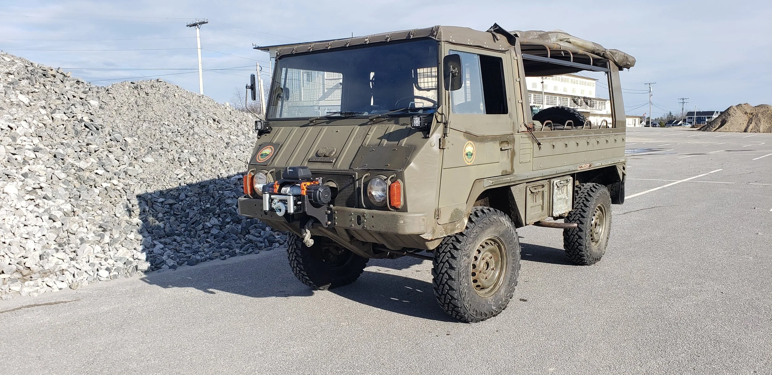 Pinzgauer 710 with canvas top in the parking lot