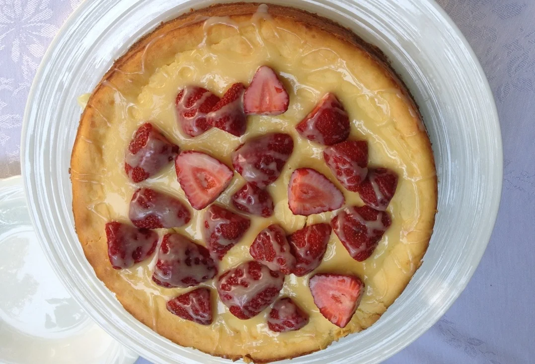 Lemon mascarpone cheesecake with white chocolate drizzle.jpg