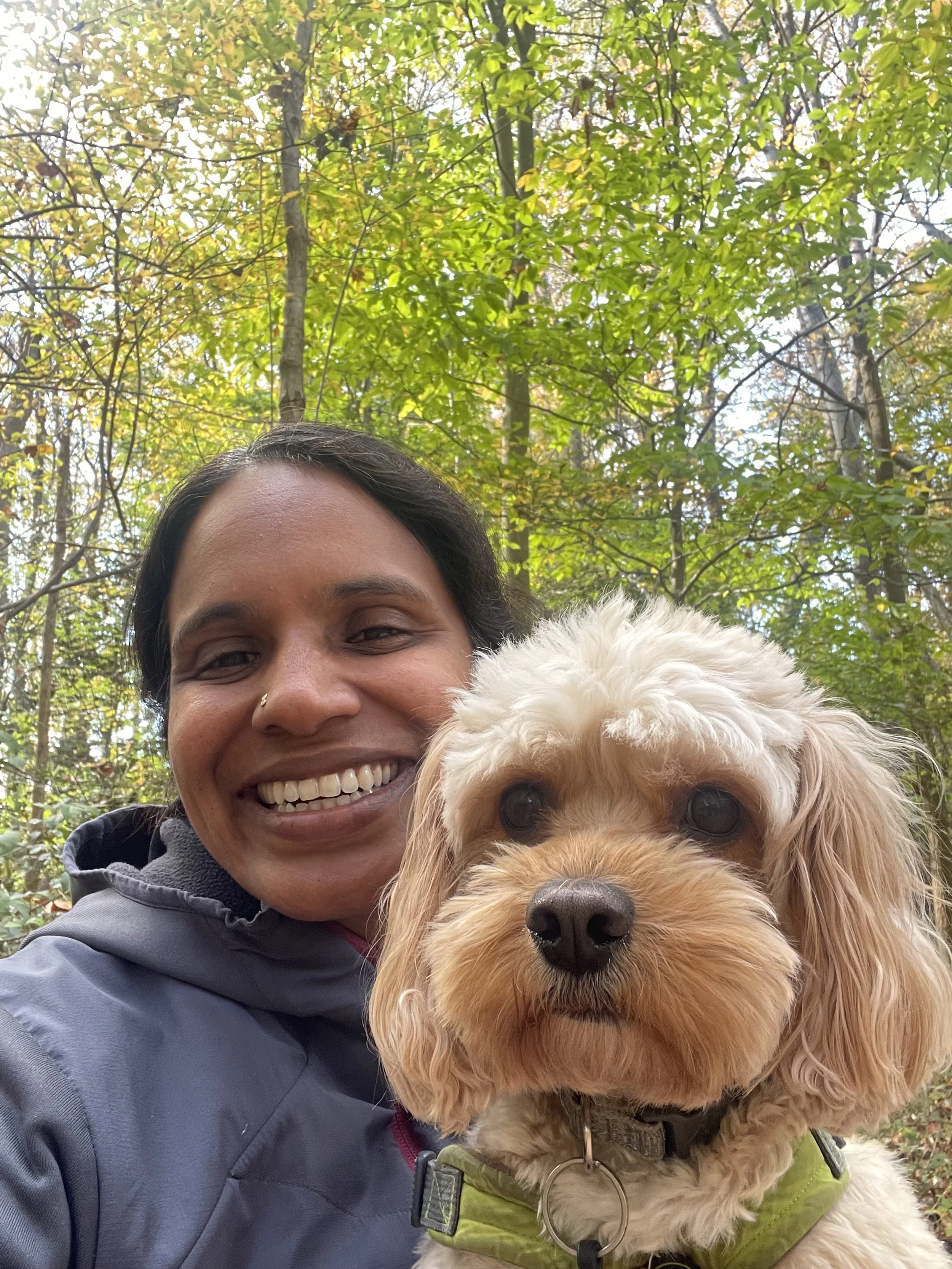 A  photo of Malini and her dog