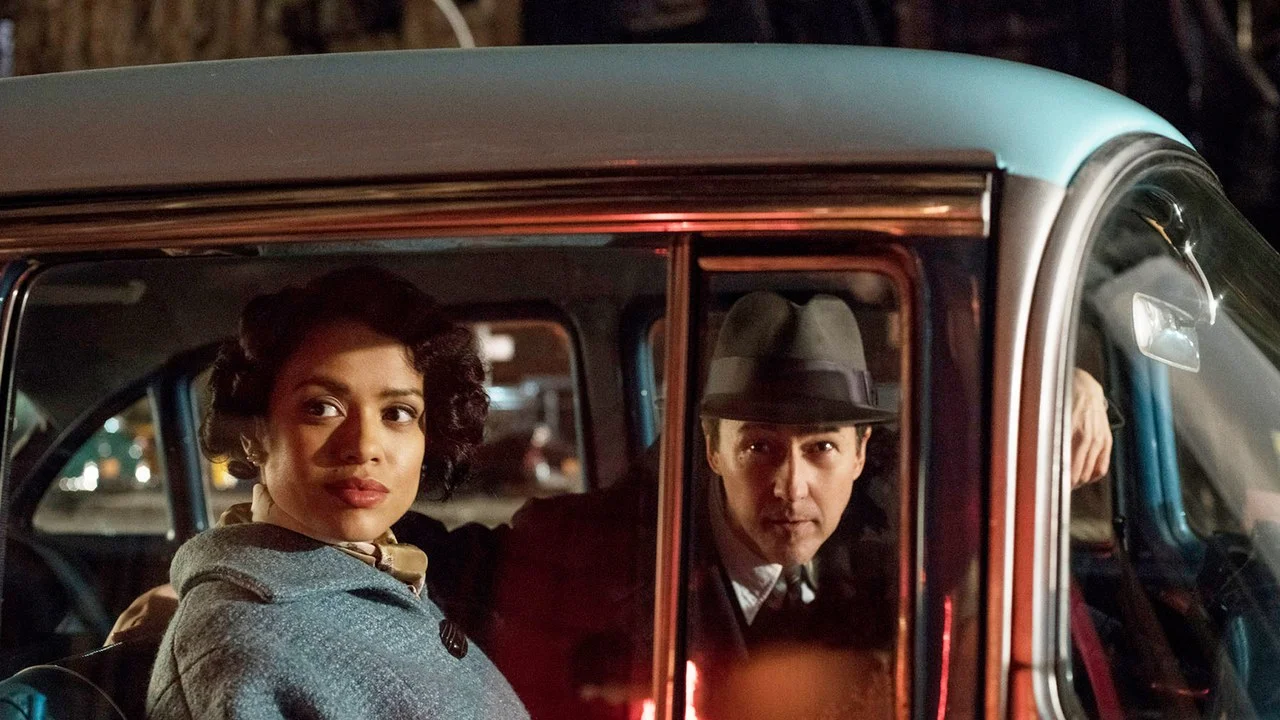 Gugu Mbatha-Raw as Laura Rose and Edward Norton as Lionel Essrog. As a black female lawyer in 1950s New York and a detective with Tourette’s Syndrome, both Laura and Lionel are “not being seen for who they really are,” says Norton.
