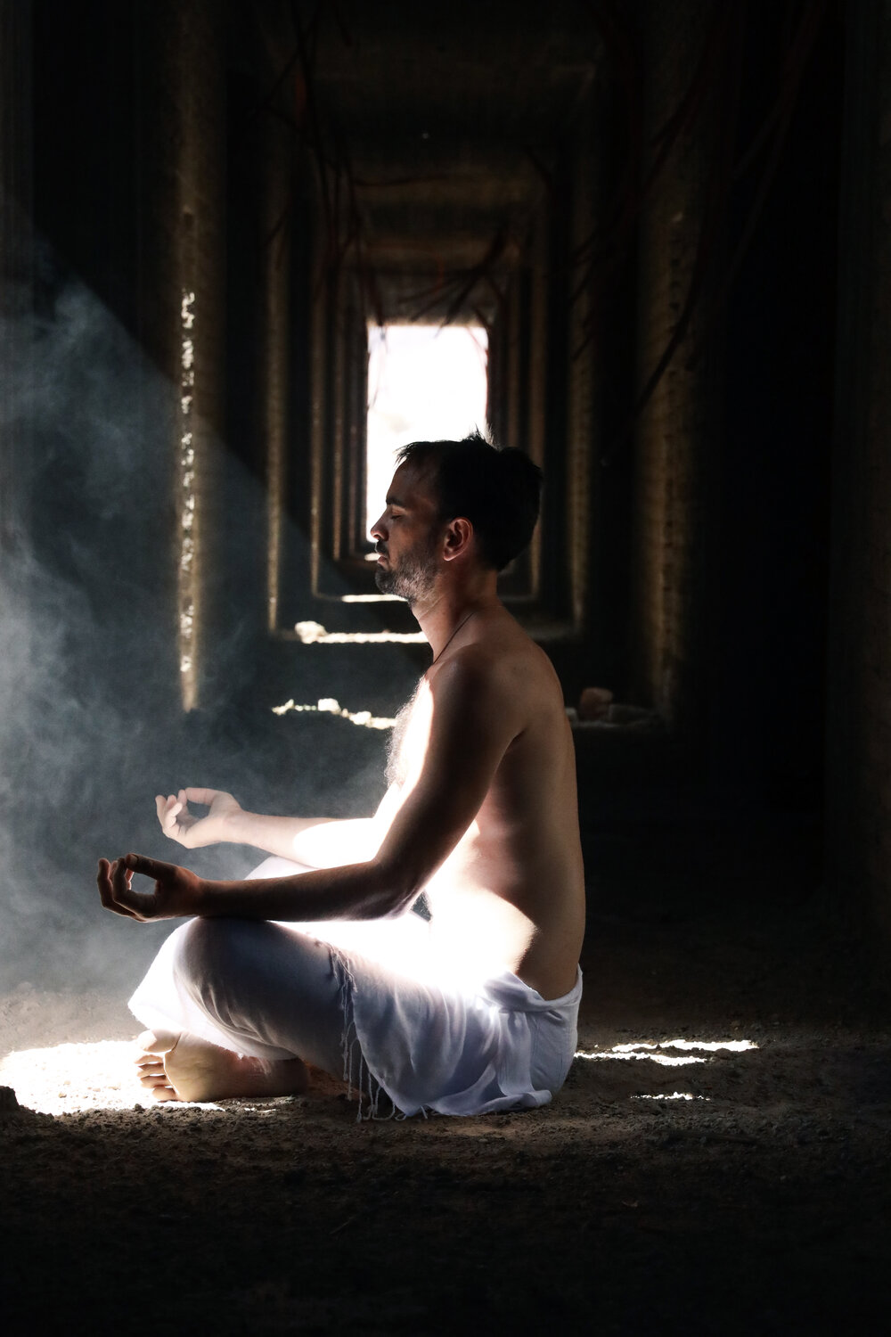 man in meditation setting by Kati Kaia 