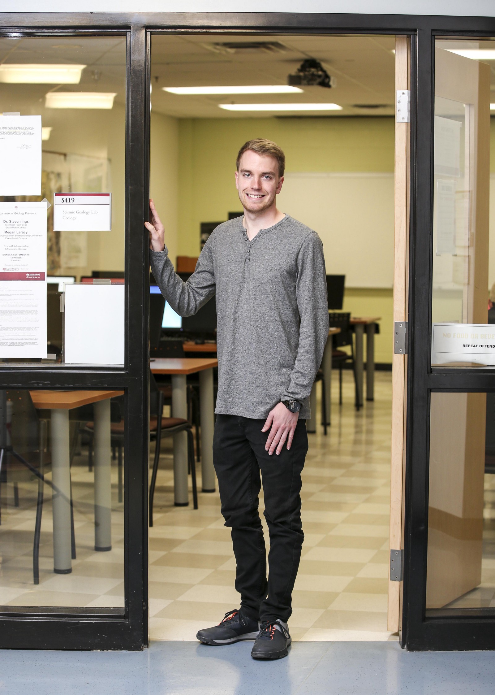 Geology student Justin Nagle stands in the Seismic Geology Lab at Saint Mary’s University in Halifax. (Photo: Megan Mahon/Communications Nova Scotia)