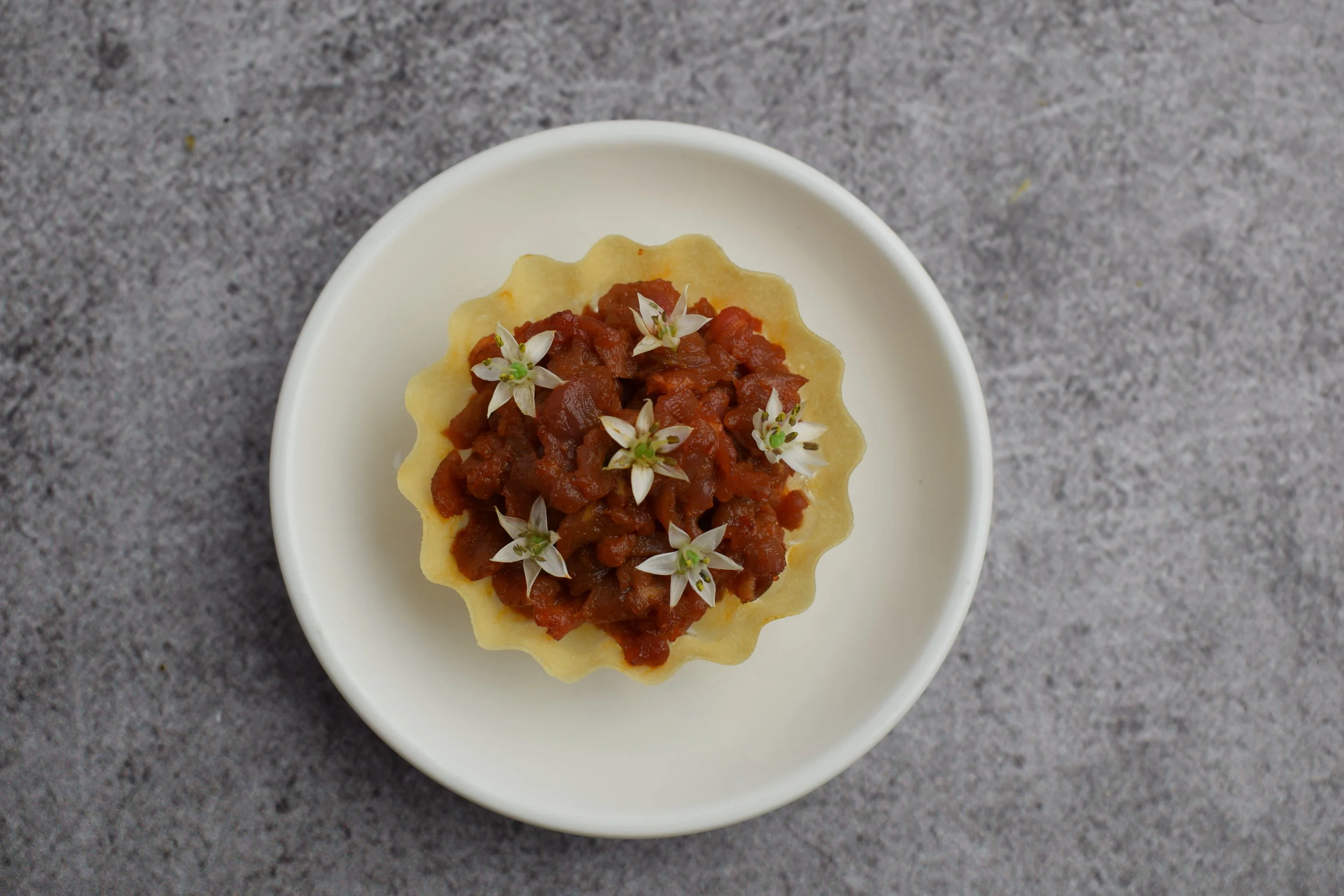 Lamb Merguez Tartar Tartlet | Aleppo Chilli | Onion Flowers