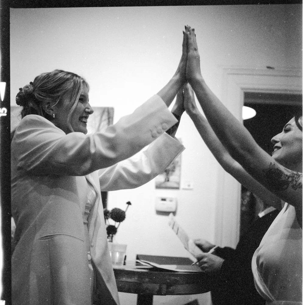Two women getting married and having the time of their lives