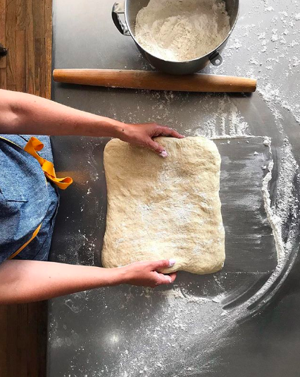 Garbacz preparing dough in the bakery kitchen.