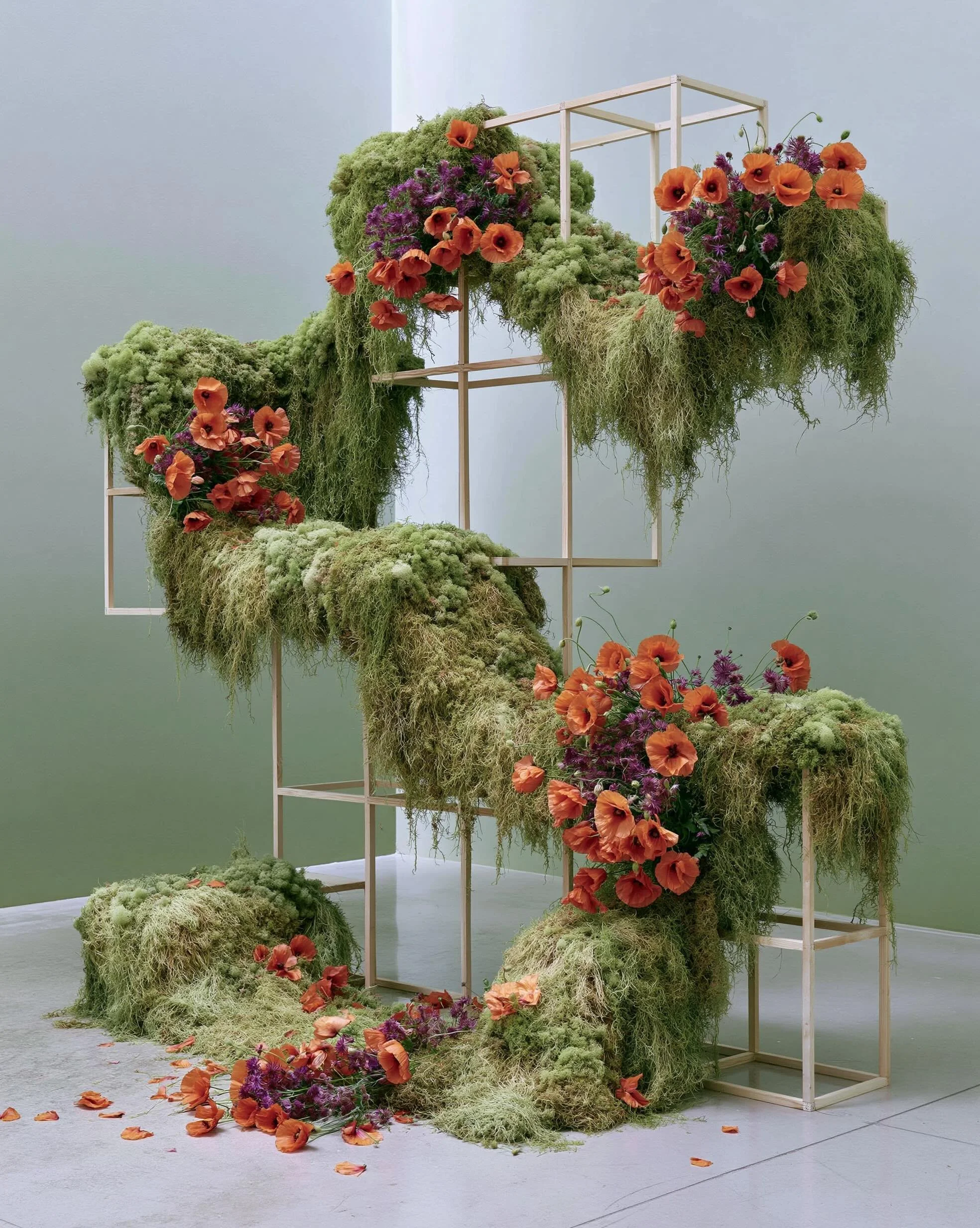 A floral installation designed to divide space without creating walls.

The open framework preserves sightlines while defining distinct event zones, allowing guests to move naturally through the room. Structure, movement, and botanicals come together