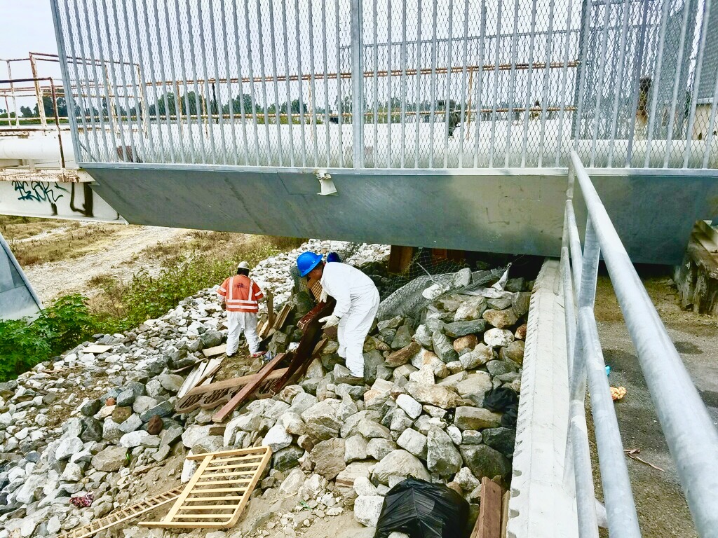 Removing debris from underpasses