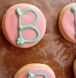 Here are the cookies for the Blog Sugar swag bags. I made 200 of these!