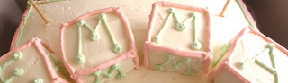 Baby blocks I made from crisped rice cereal treats and butter cream frosting.