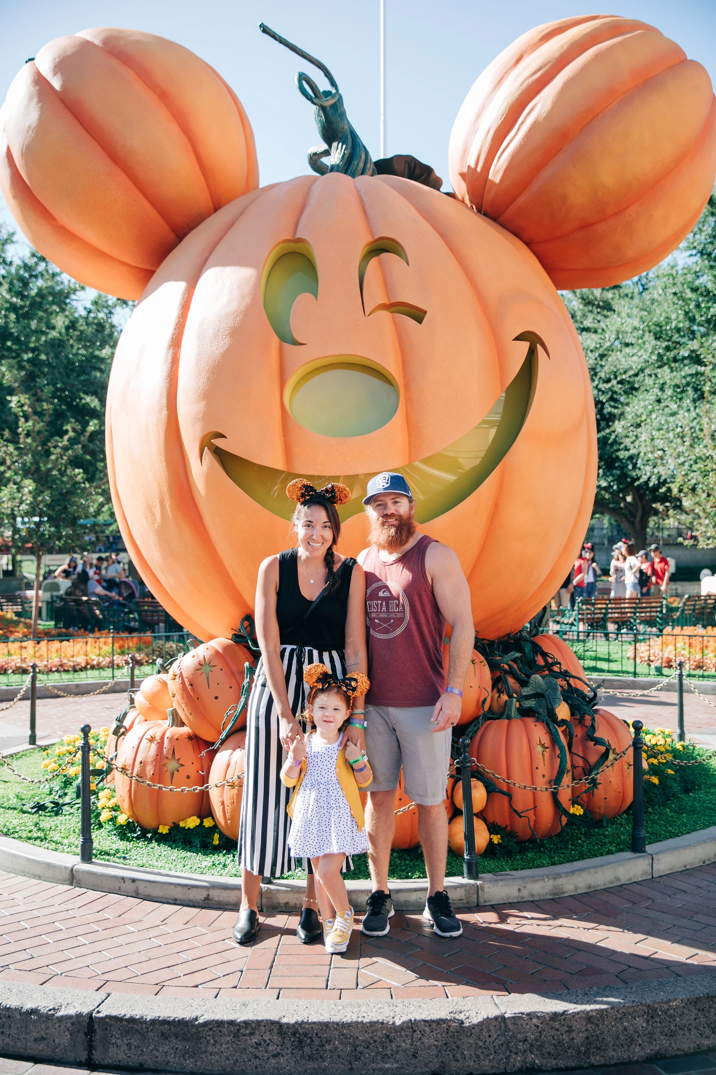 The most popular spot for Halloween Time family photos is in front of the giant Mickey Mouse pumpkin which is inside Disneyland! It is so cute and right at the entrance to Main Street, you won’t miss it. You may have to wait in line. I’d try and get to the park when it opens and snag your photos first thing.