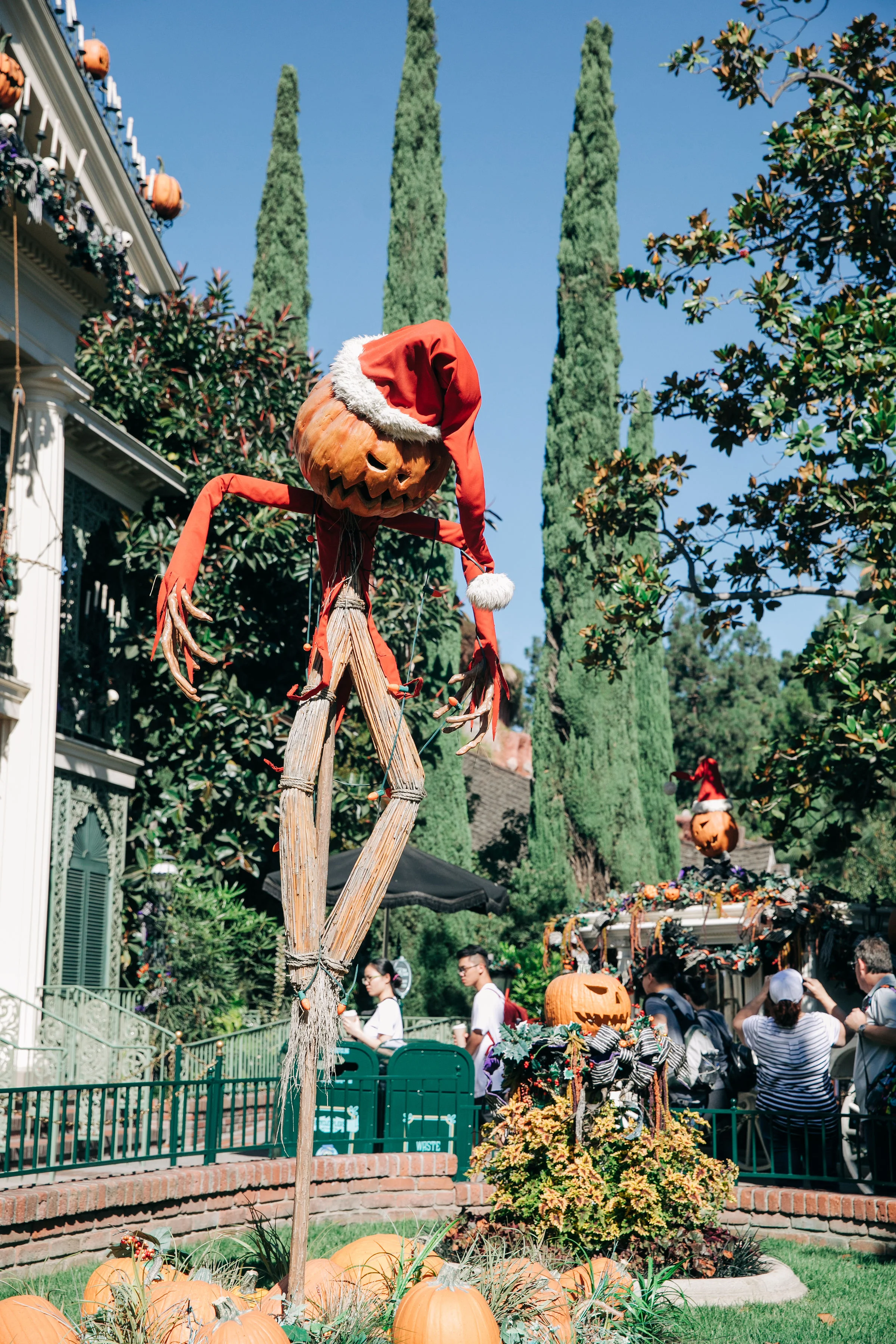 I love the Pumpkin King right at the entrance to The Haunted Mansion Holiday attraction! This attraction is THE BEST! It is by far our favorite thing to ride during Halloween time. Don’t forget to get a Fast Pass for this attraction right away. Most days the Fast Passes for this attraction will run out by late afternoon. You can get a Fast Pass by either going to the Fast Pass distribution area which is located near the attraction itself OR by using MaxPass via the Disneyland app.