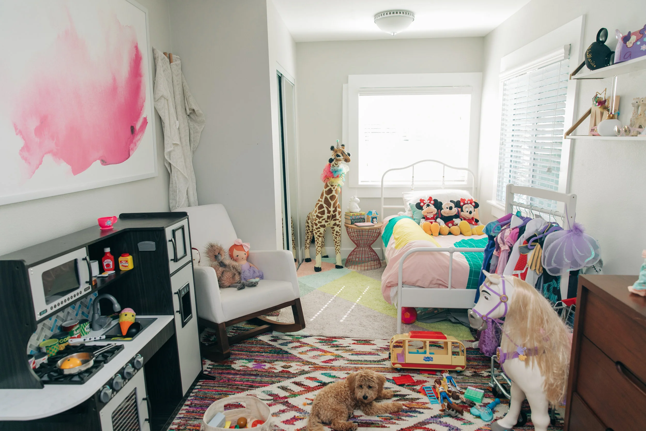 Here you can see to the left is the large art print that used to hang above Mila’s crib. To the right you can see just the corner of Mila’s dresser. I spy Marley too hanging out!