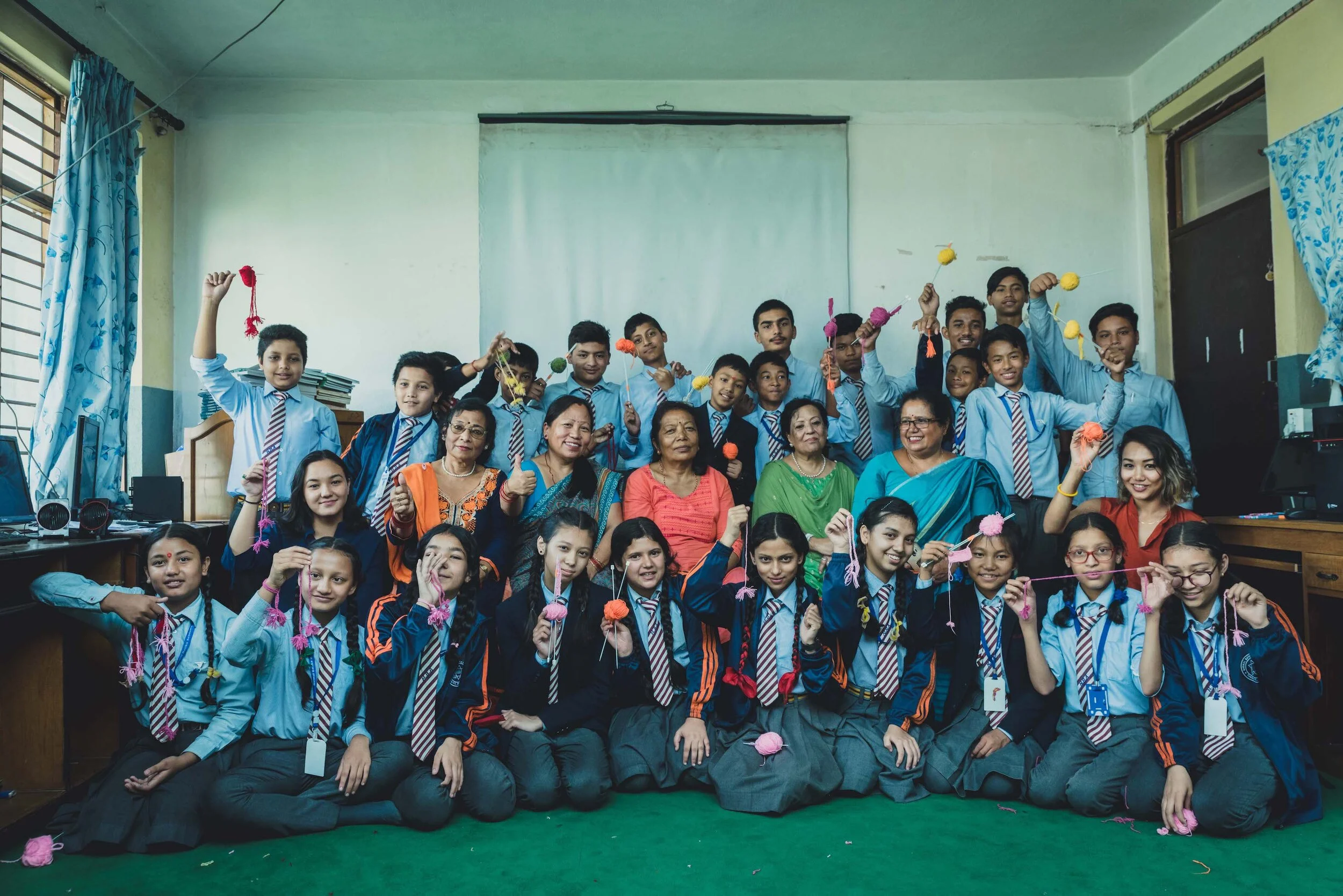 Aji’s makers along with students from Nirmal Batika Academy and Aji’s Co-founder Lorina.