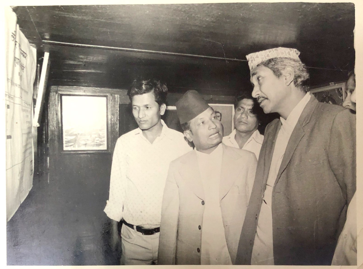 Yagya Man giving a site tour to the then Minister while he was working in the Land Administration Department