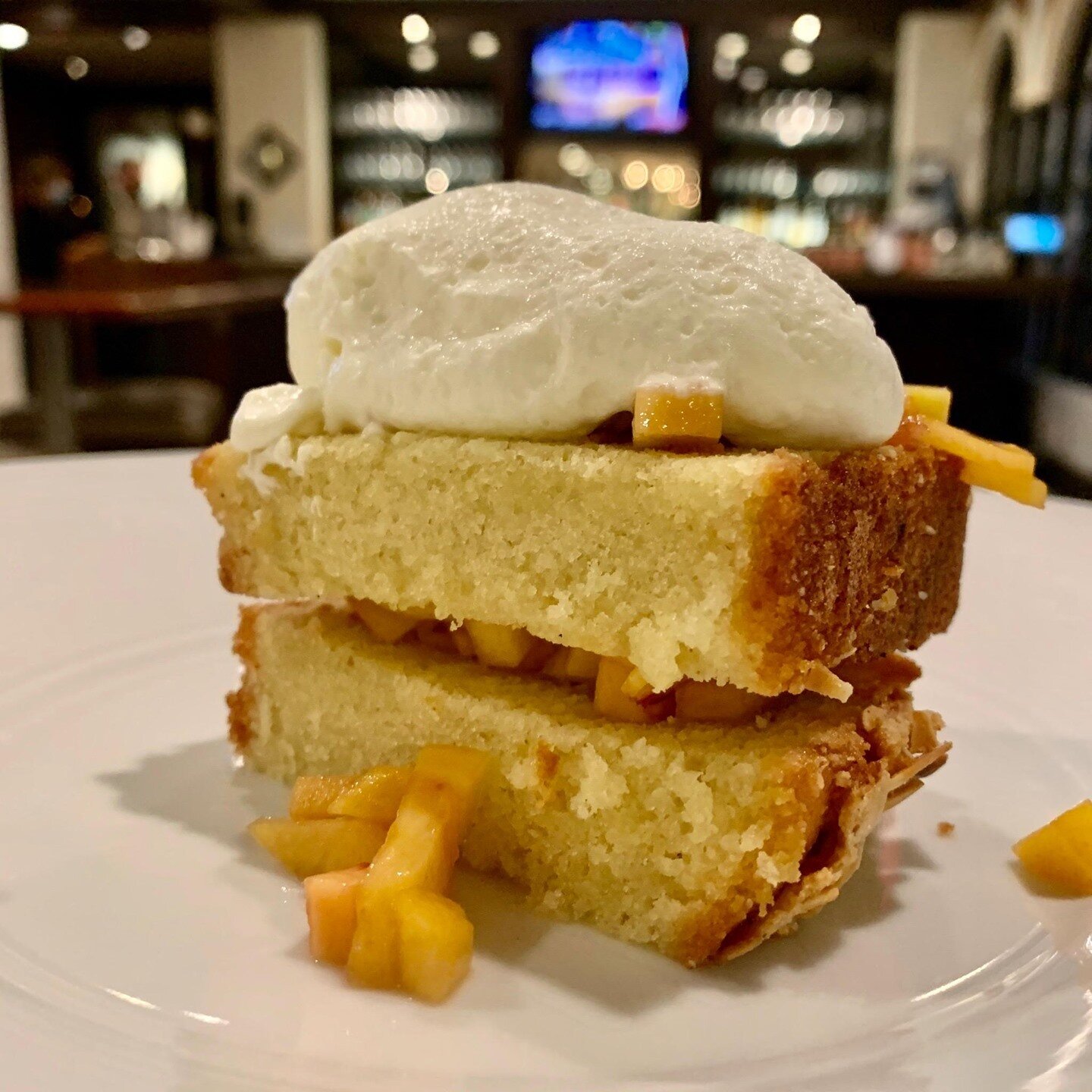For dessert, our Warm Peach Almond Cake is the perfect choice to celebrate the peach season. This dessert was created to honor Bacchus, the god of agriculture and wine, and the newly restored statue at @ncartmuseum. This dessert will be available thr