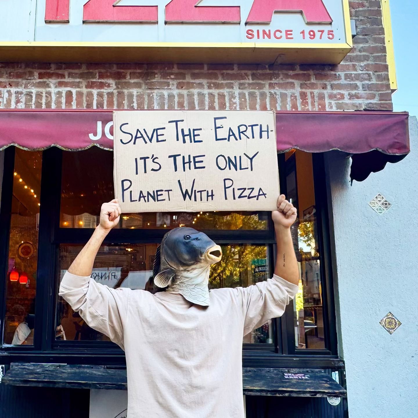 Slice it any way you want, one candidate cares about the planet and one doesn&rsquo;t. 🍕🌍 #fishwithasign