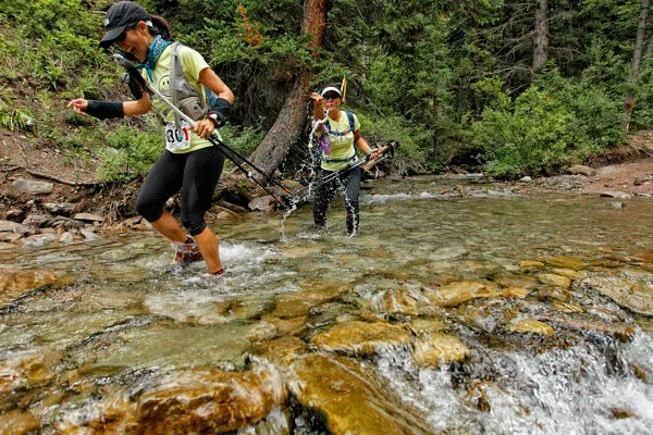 Transrockies 2011 - Having fun in the water with my teammate, Tracie - Team Double Happiness!