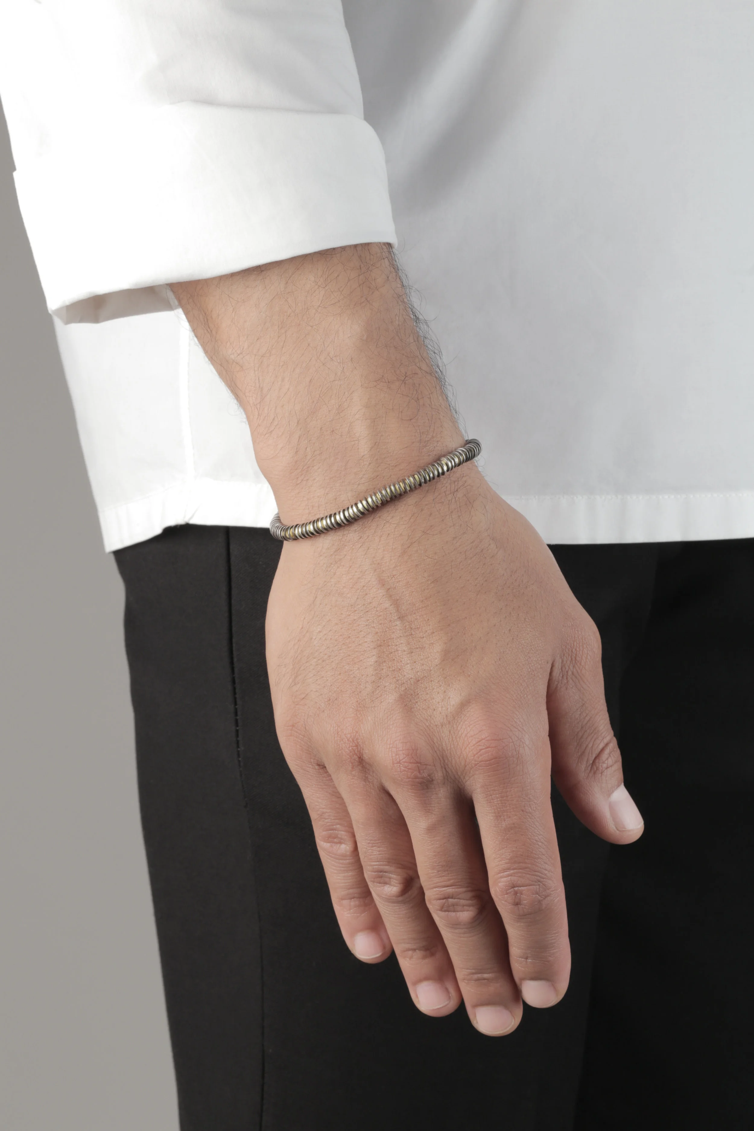 The Multicolor Volta Bracelet_Yellow_hand.jpg
