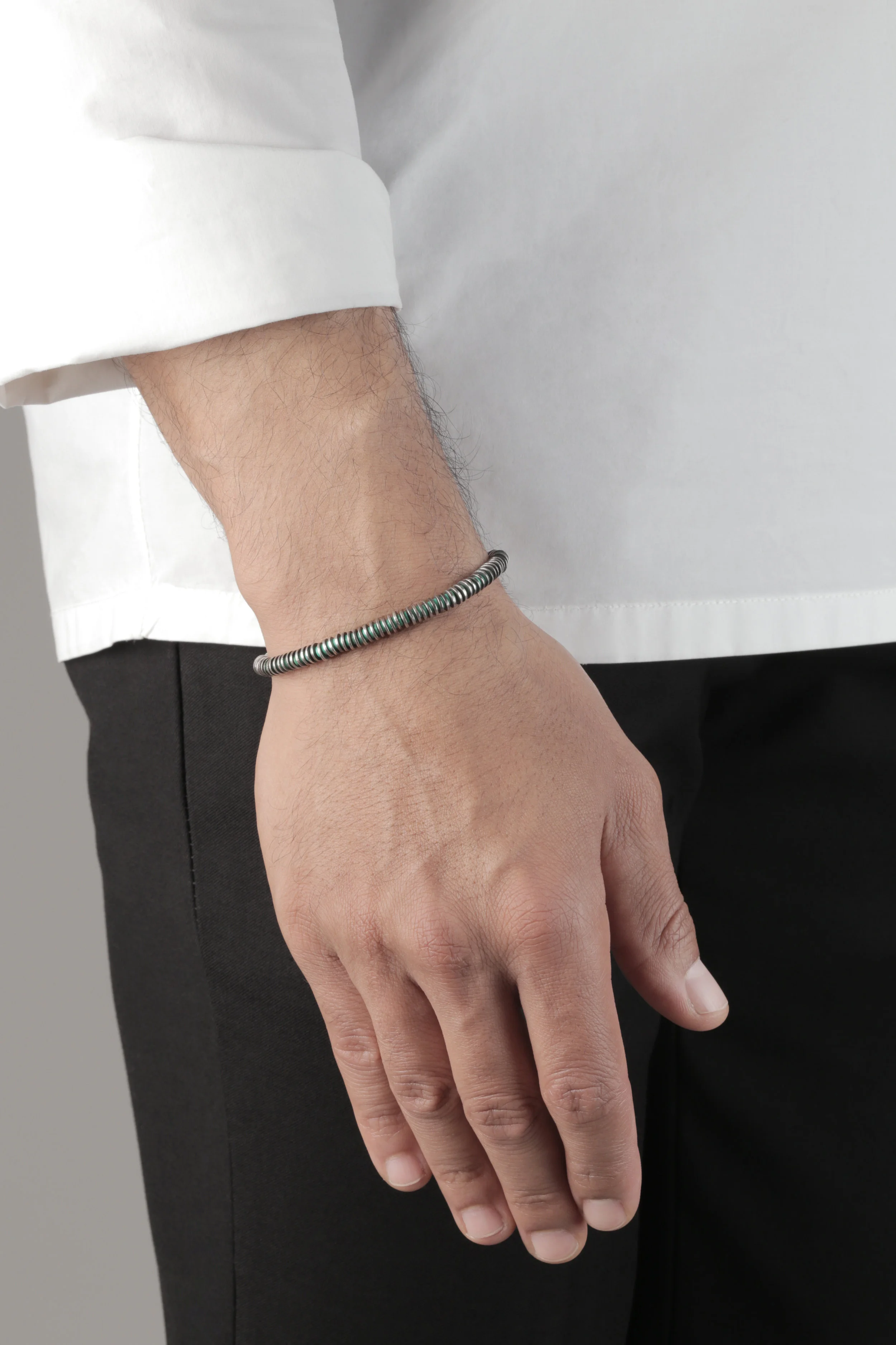 The Multicolor Volta Bracelet_Turquoise_hand.jpg