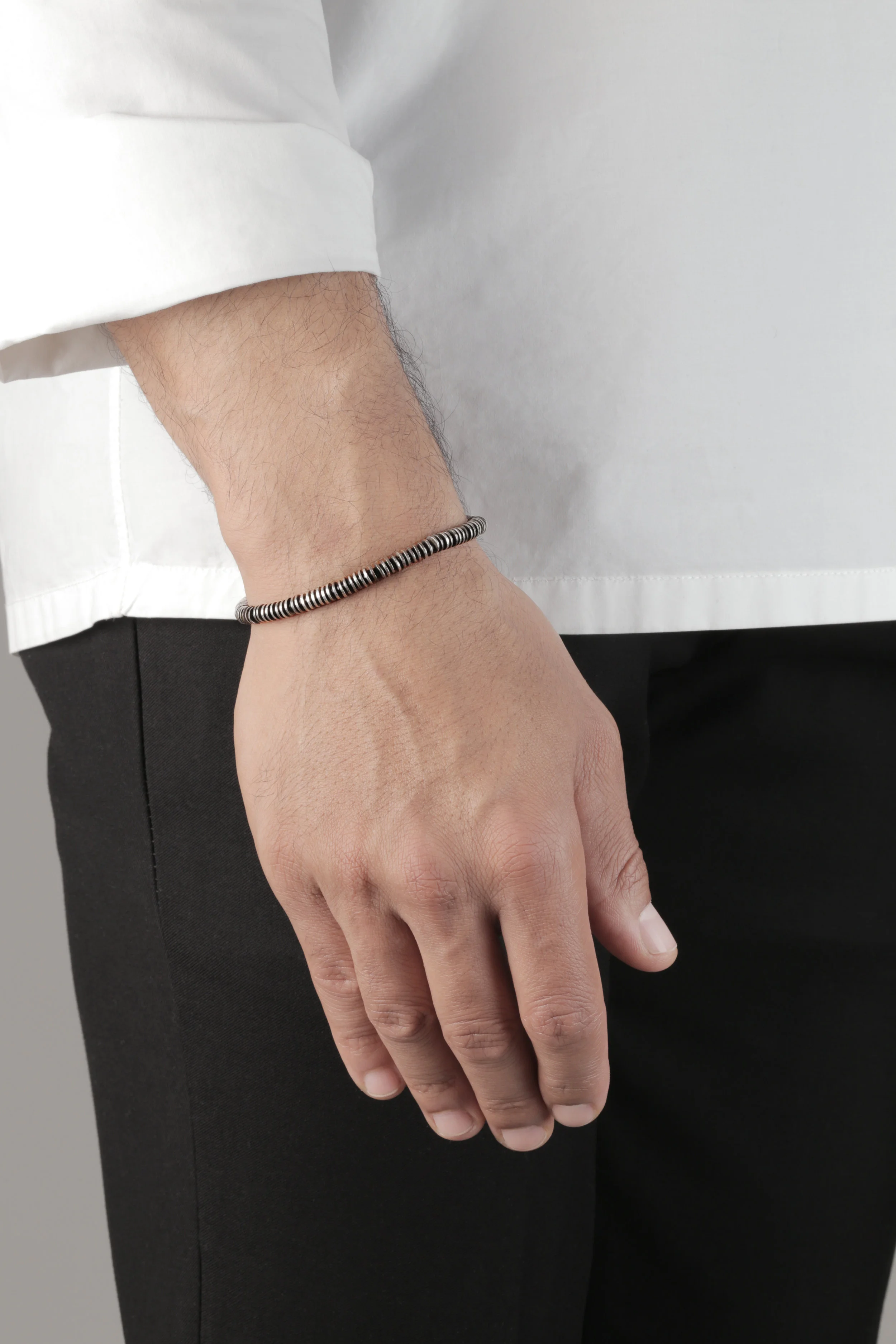 The Multicolor Volta Bracelet_Black_hand.jpg
