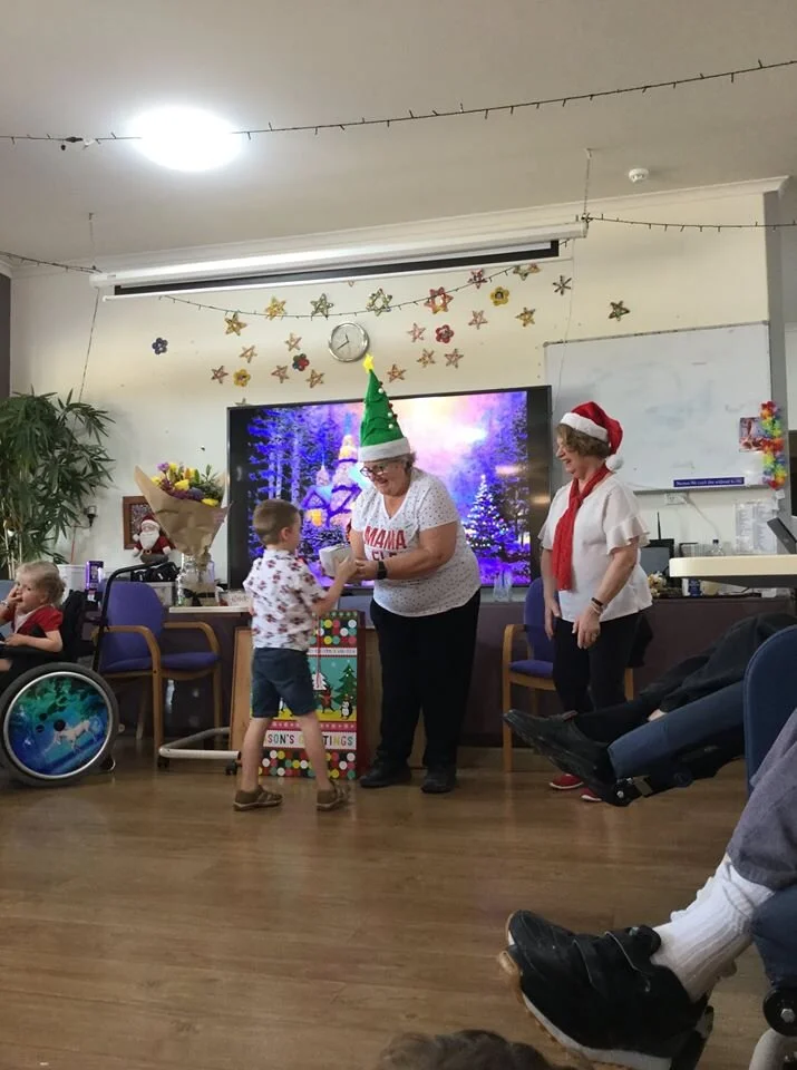 Singleton children celebrate Christmas with the residents of Mercy