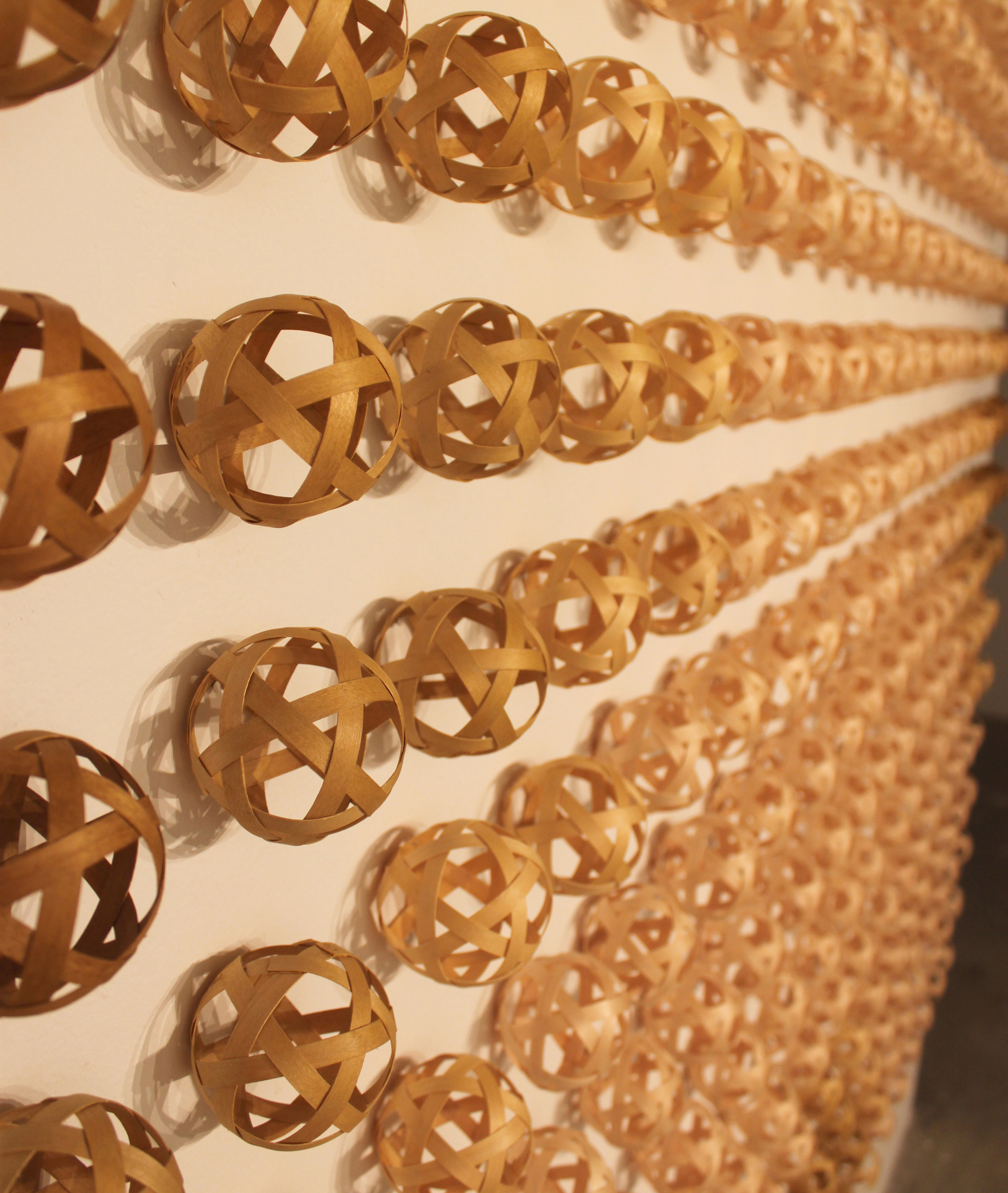   In Flow  400 hand-woven spheres: maple veneer, dye 102" x 78" x 2.5" 2011 