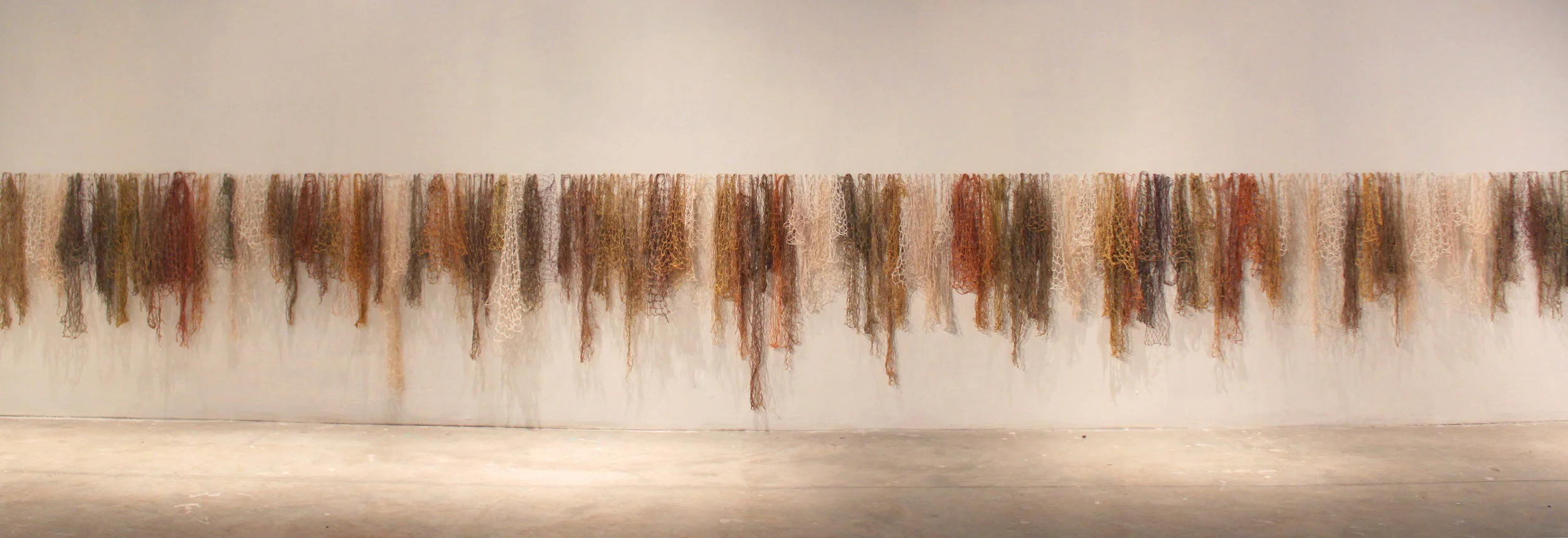   In the Full Functioning of Body and Mind  120 hand-tied nets: cotton, waxed linen thread, dye 244" x 24" x 1" 2011 