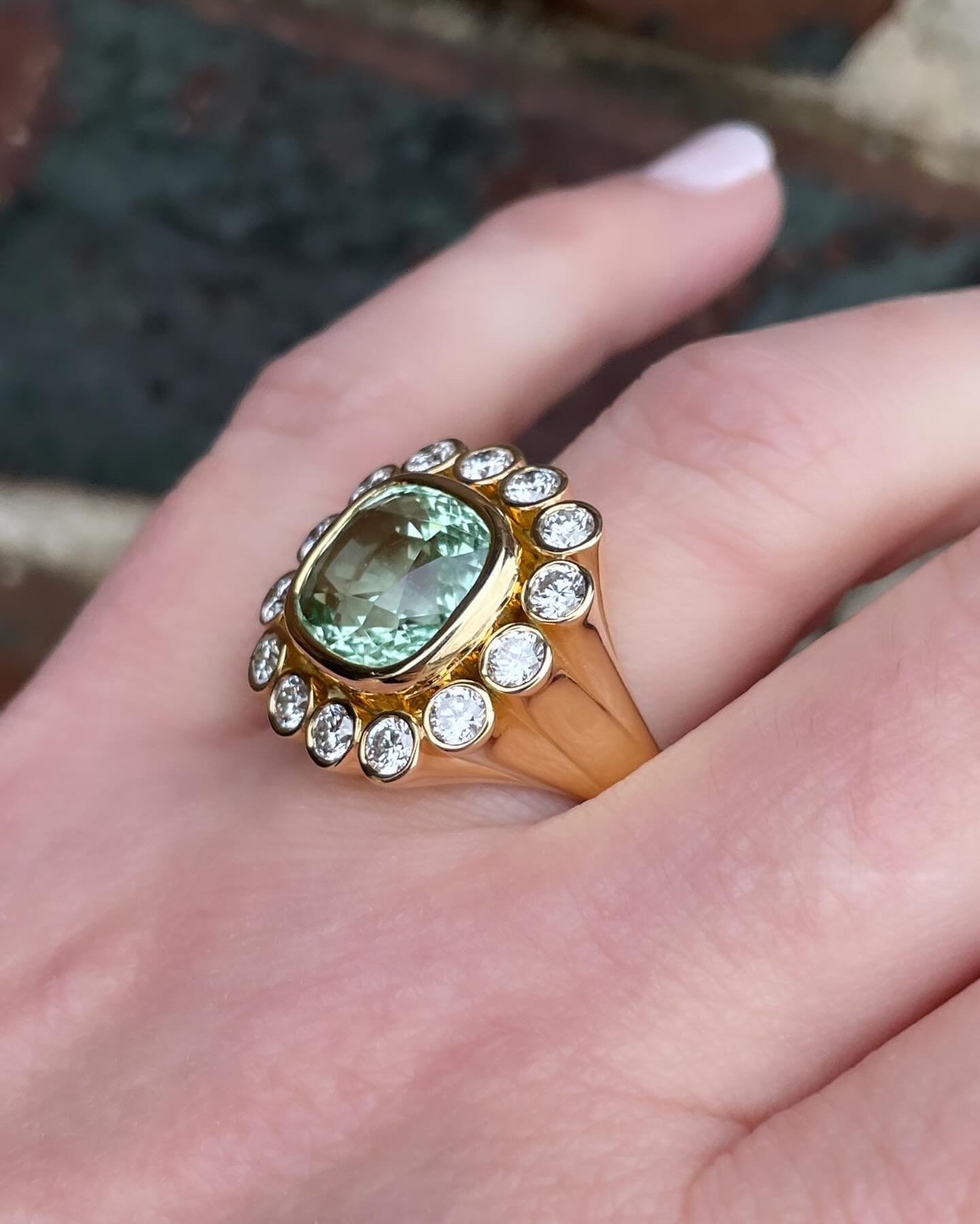 Wildflowers bloom in the spring and I&rsquo;d say we have the most beautiful of them all! This one of a kind @brentnealejewelry cushion mint green tourmaline and diamond ring can be found in store along with so many other amazing pieces at our person