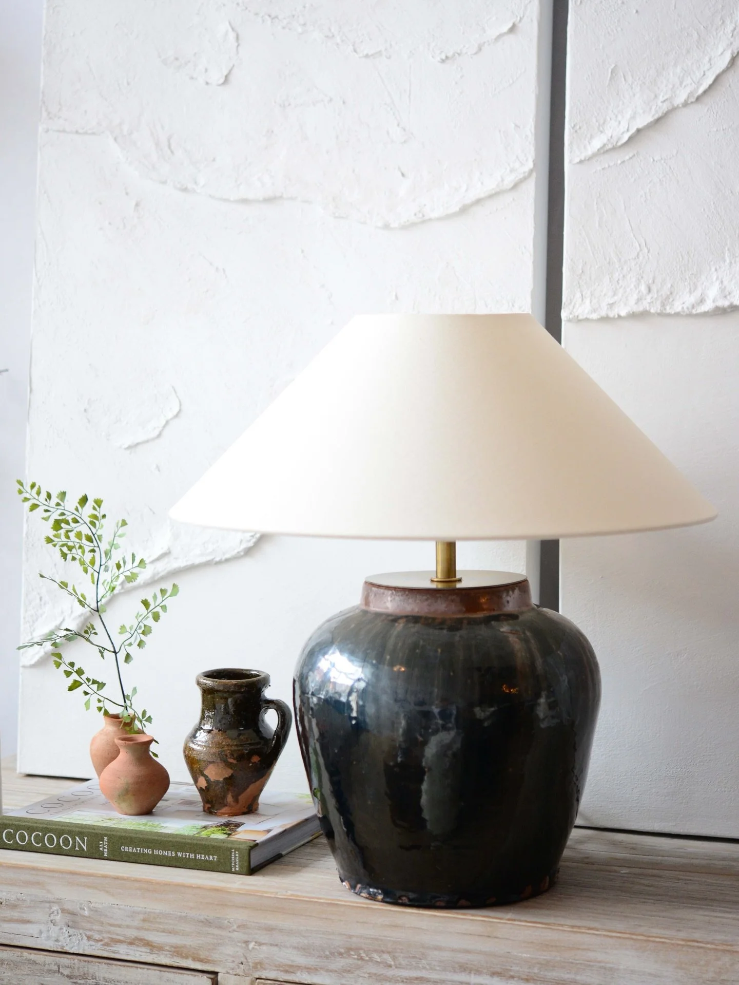 those one of a kinds &bull; lighting edition. 

created by repurposing authentic vintage pottery, our &lsquo;mylan&rsquo; vintage pot lamp provides for a one of a kind lighting statement, elevating any interior with its timeworn and storied details.
