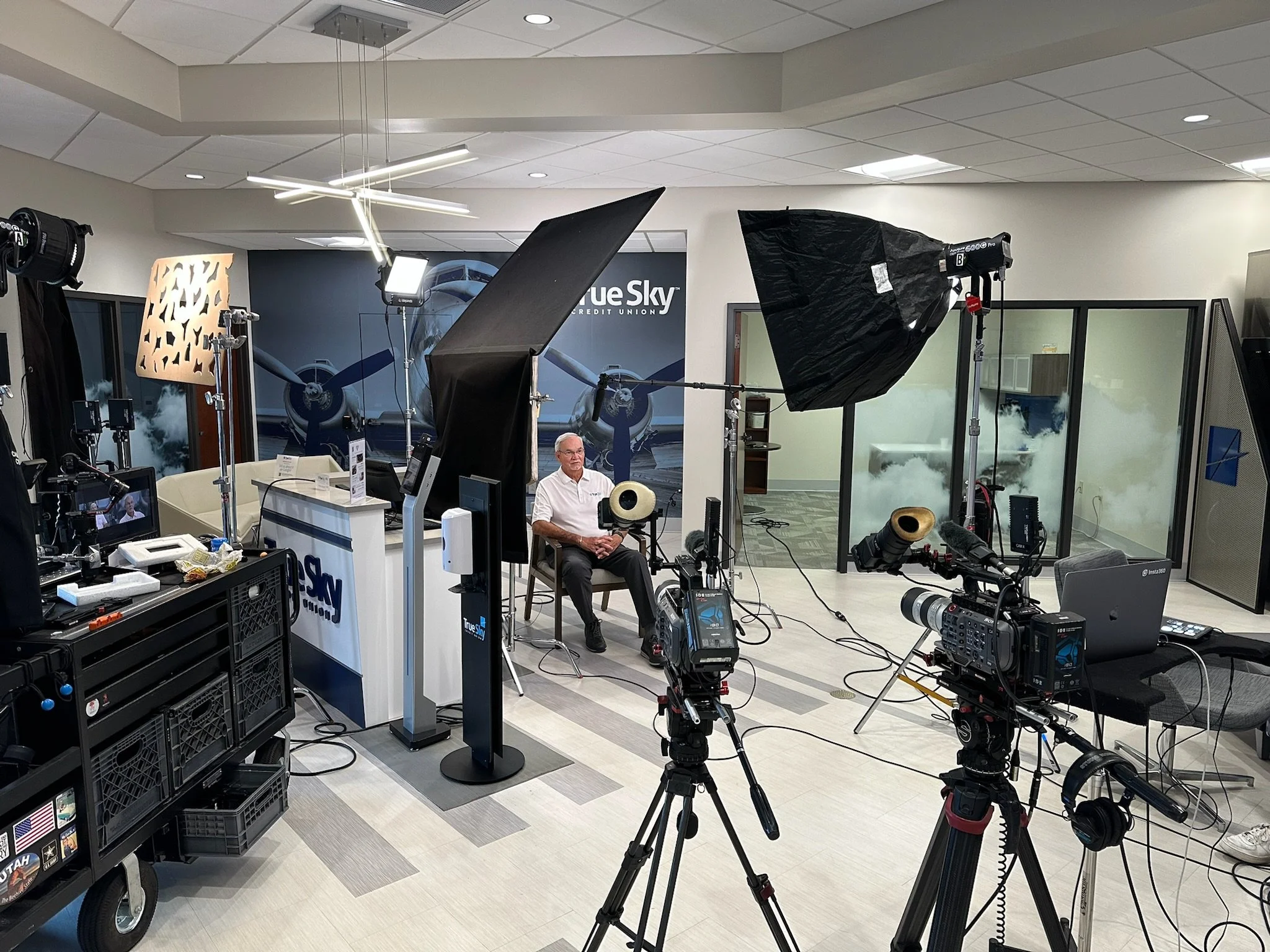 Two-camera video production setup with lighting and sound