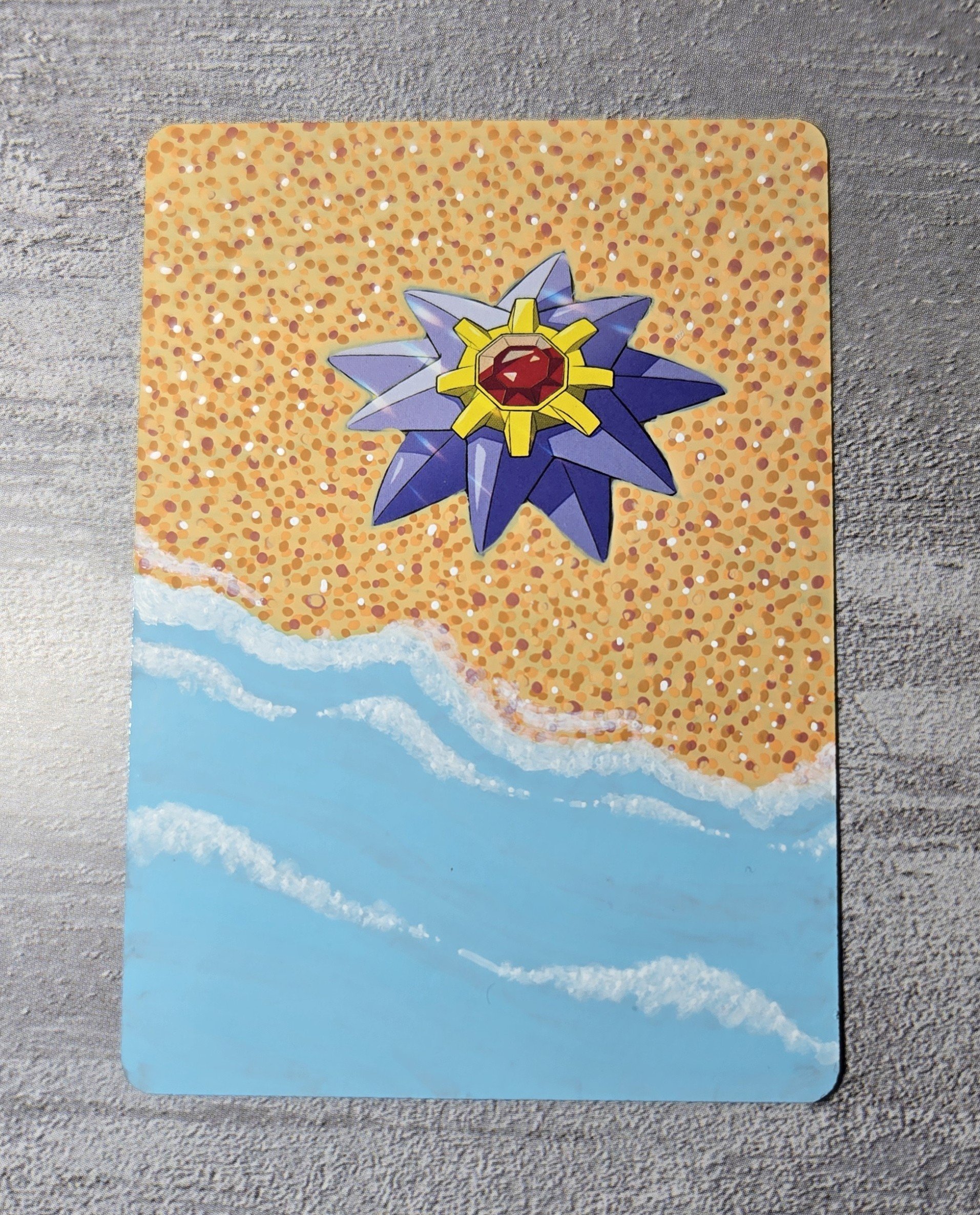 Starmie : I painted her relaxing on the sand at the beach.