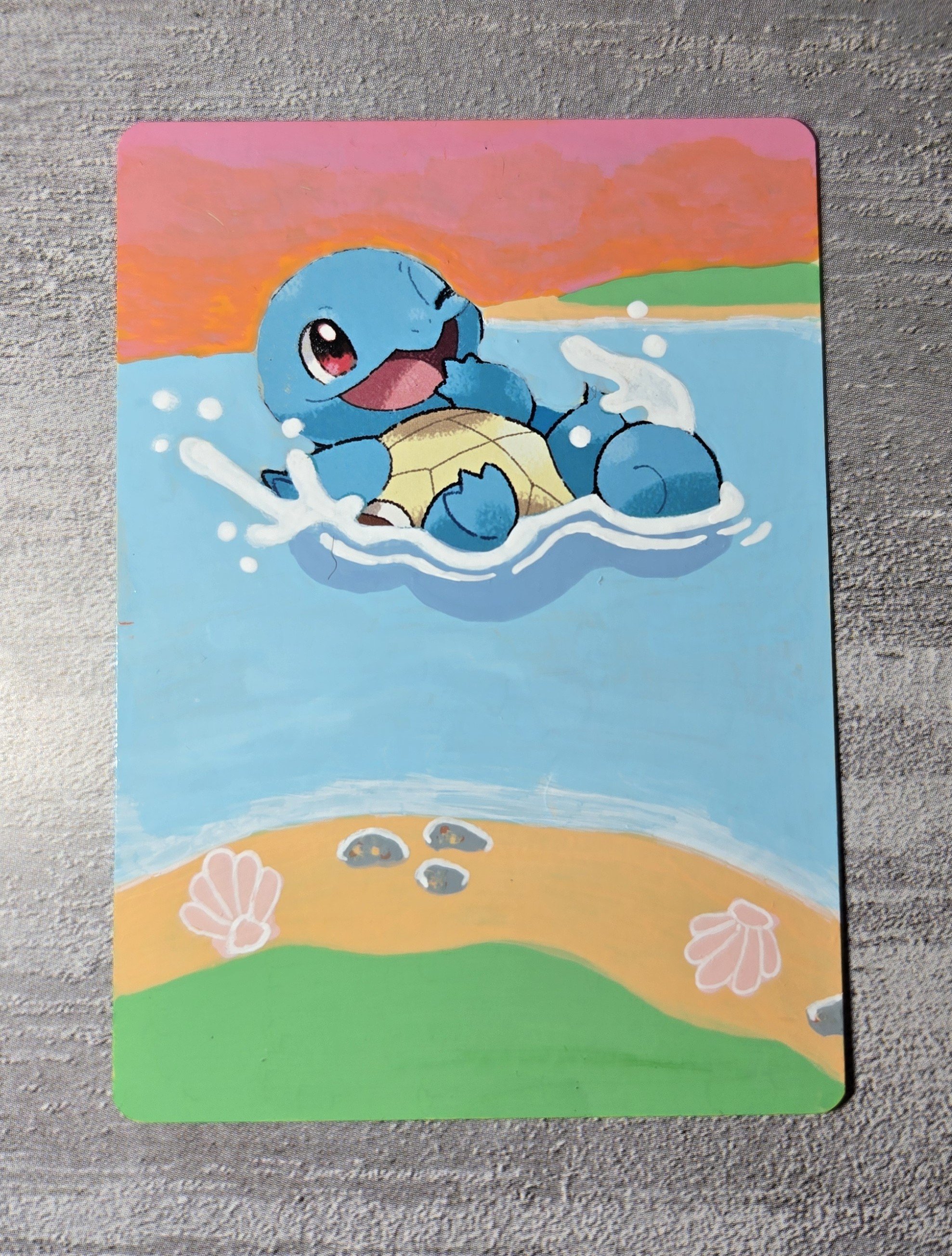 Squirtle : I painted him splashing in the water on the lake at sunset.