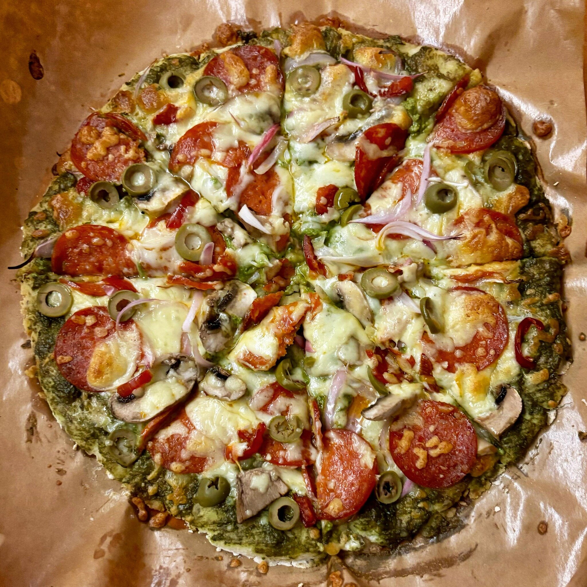 When it&rsquo;s been the kind of long day that has you craving junk food, but you&rsquo;re not allowed gluten, yeast, or tomatoes, you make yourself a gluten free, yeast free, pesto pizza with mushrooms, pepperoni, and olives. Cravings satisfied!